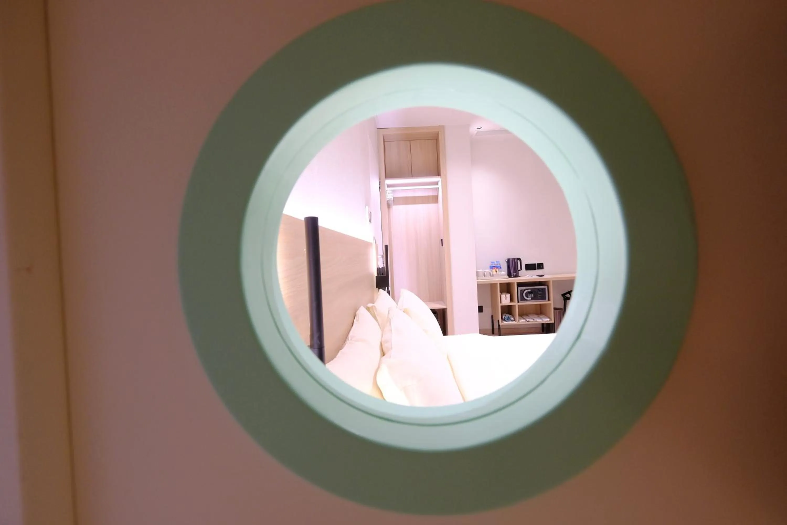 Bed in Rest Bugis Hotel