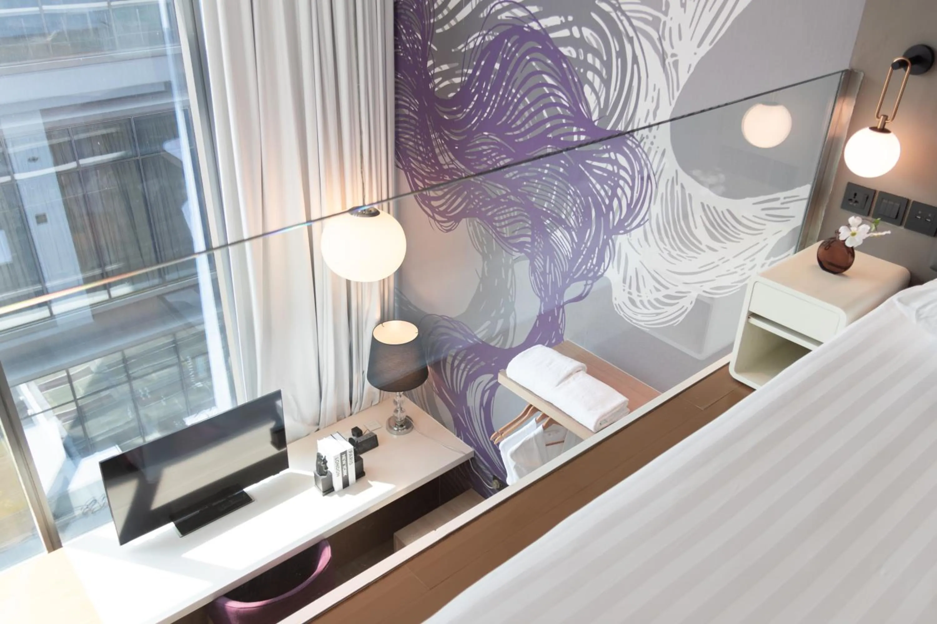 Bed in Studio M Hotel