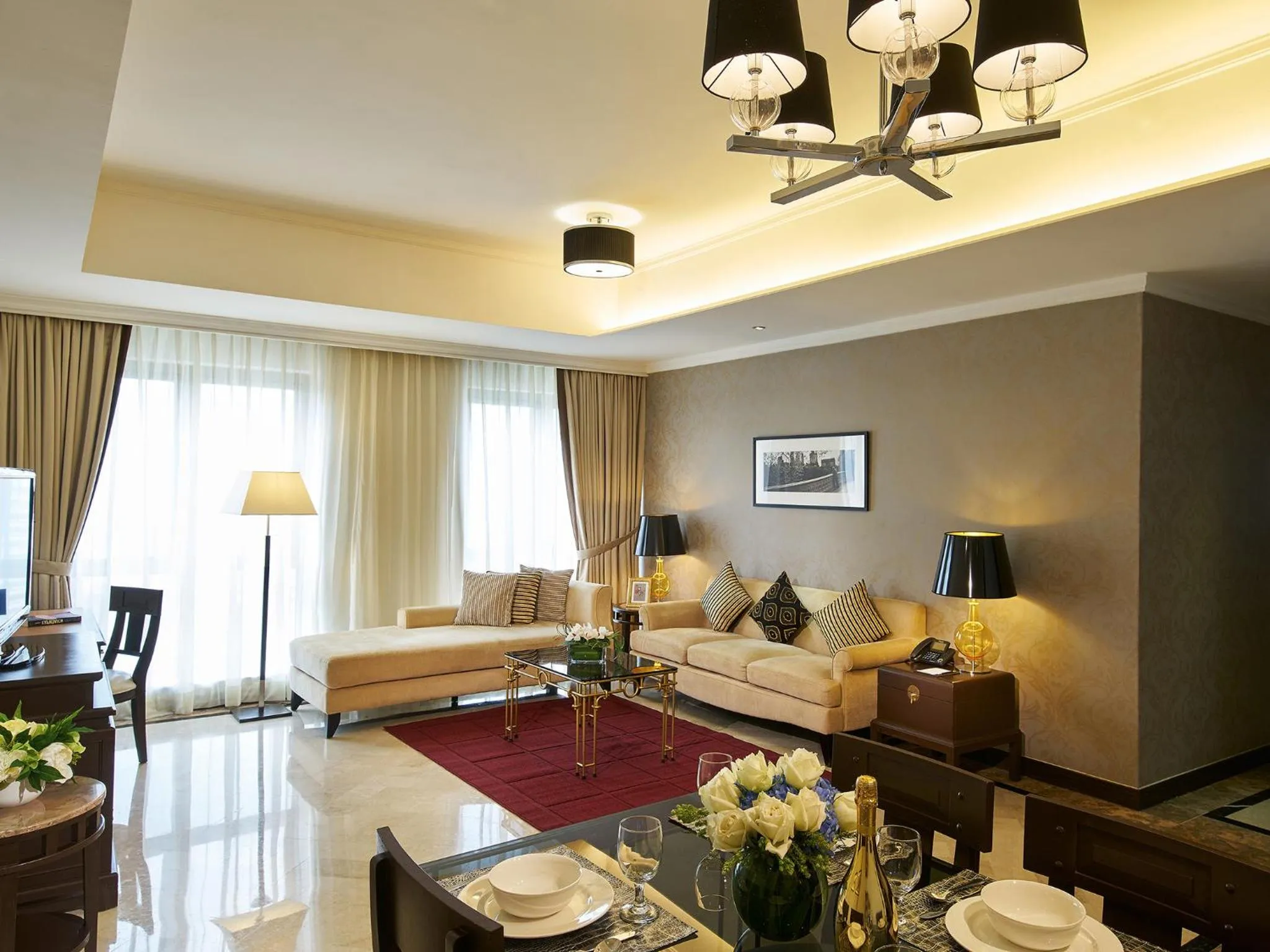 Communal lounge/ TV room in Orchard Parksuites by Far East Hospitality