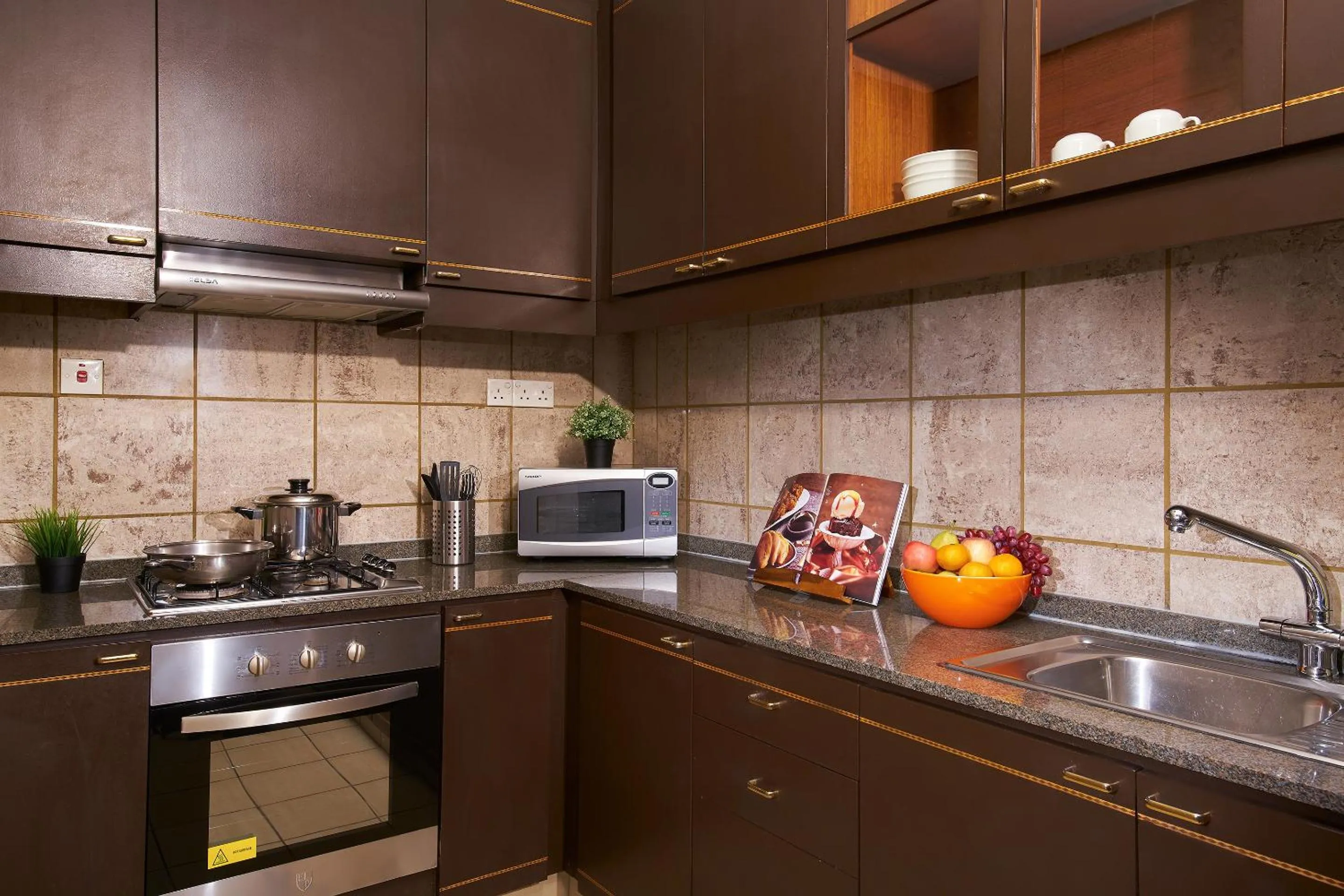 Kitchen or kitchenette in Orchard Parksuites by Far East Hospitality