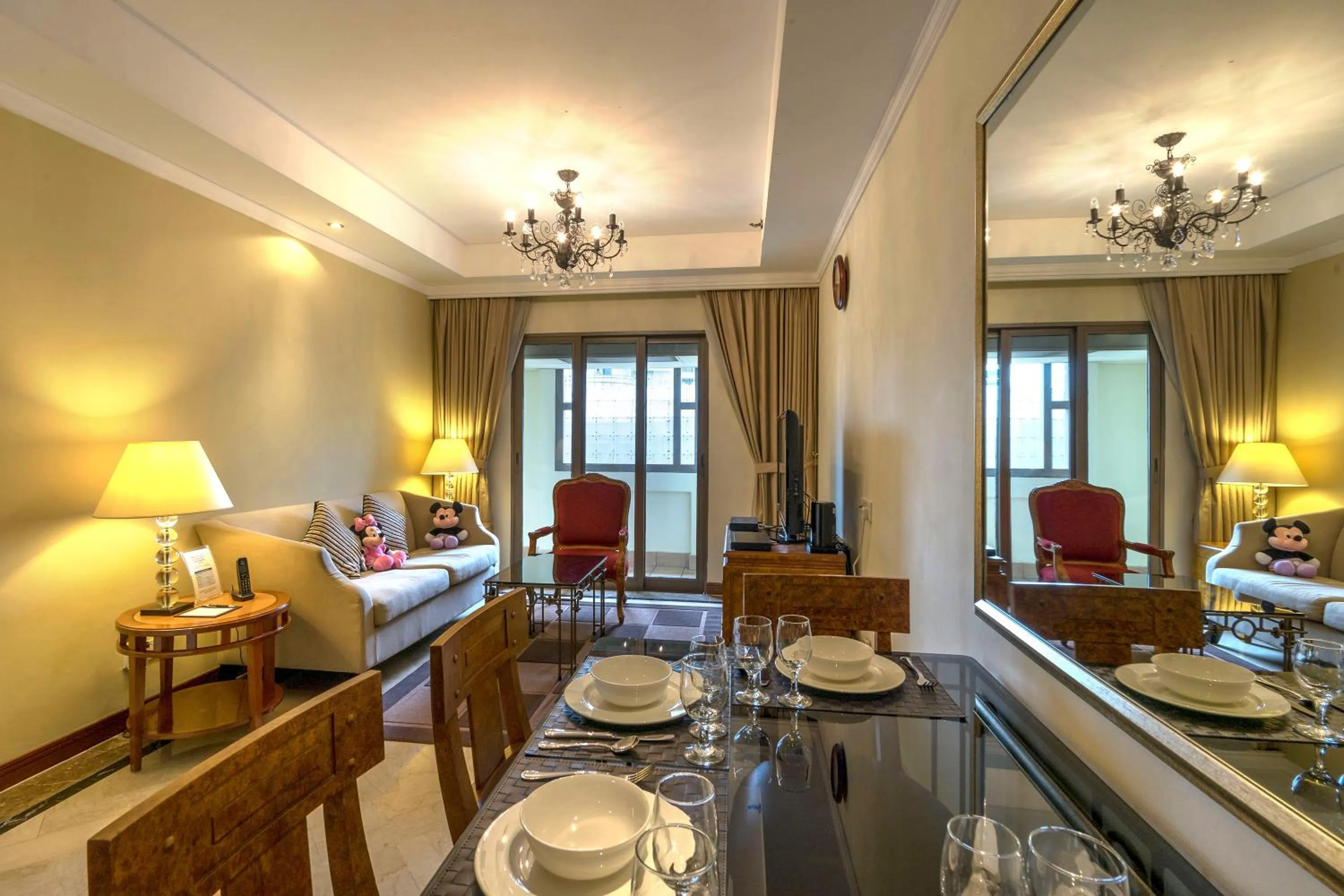 Living room, Bed in Orchard Parksuites by Far East Hospitality