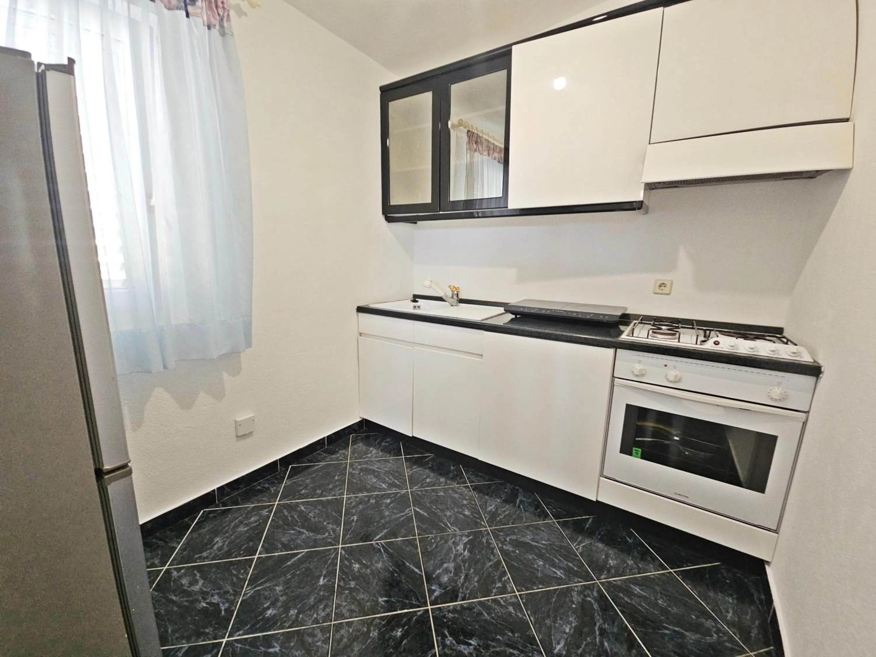 Kitchen or kitchenette in AB Villa Podstrana