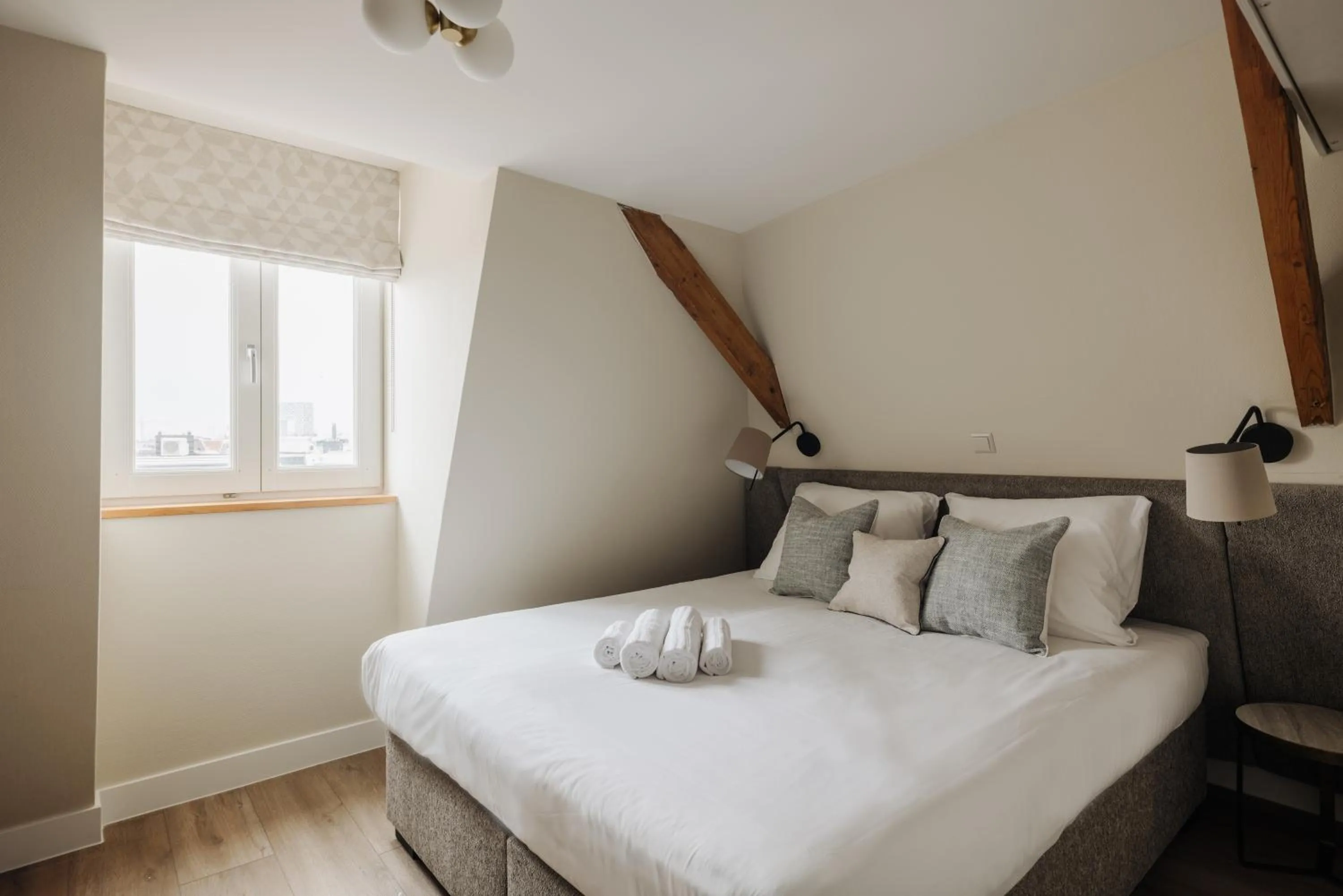 Bed in Adam Suites Hotel