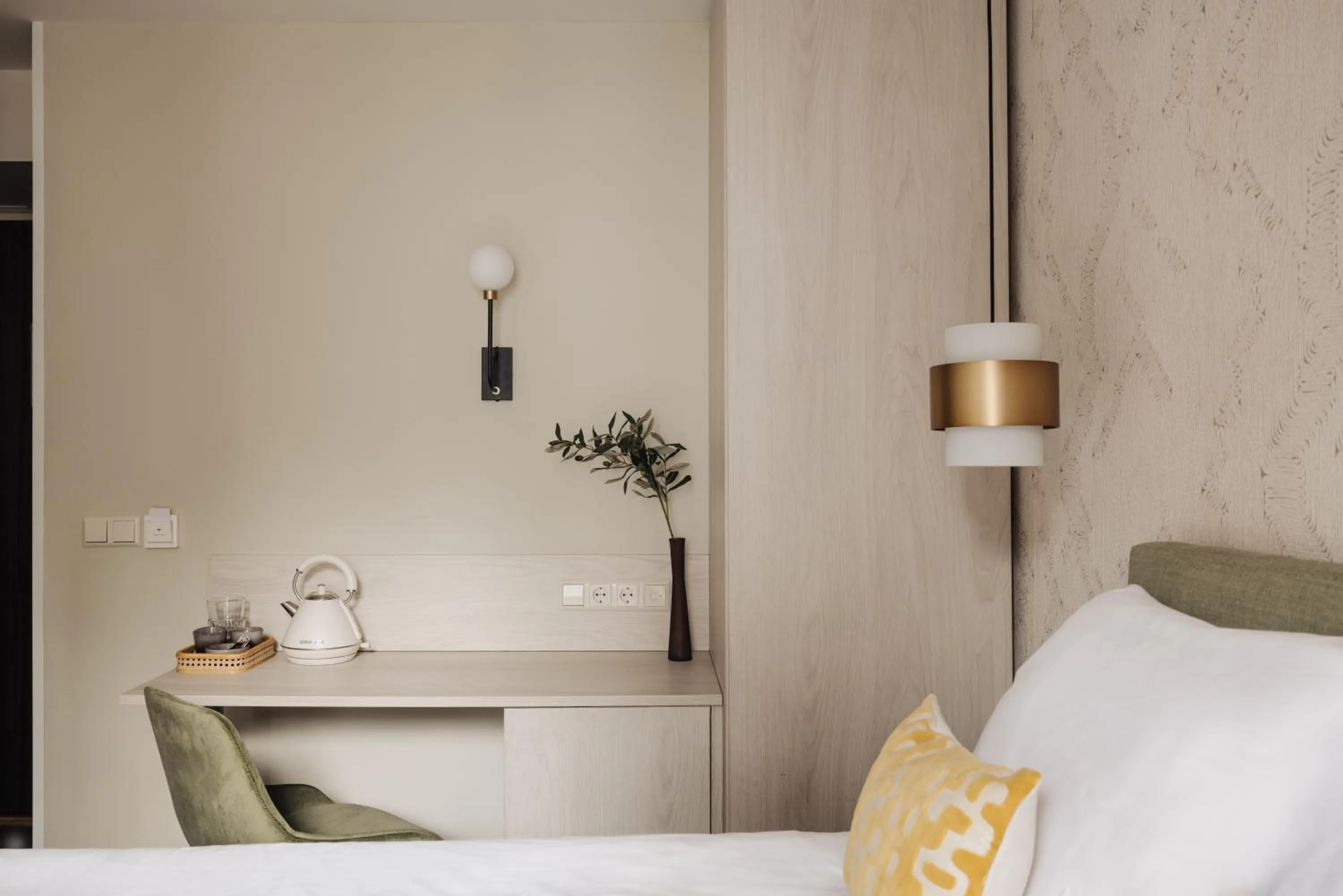 Bed in Adam Suites Hotel