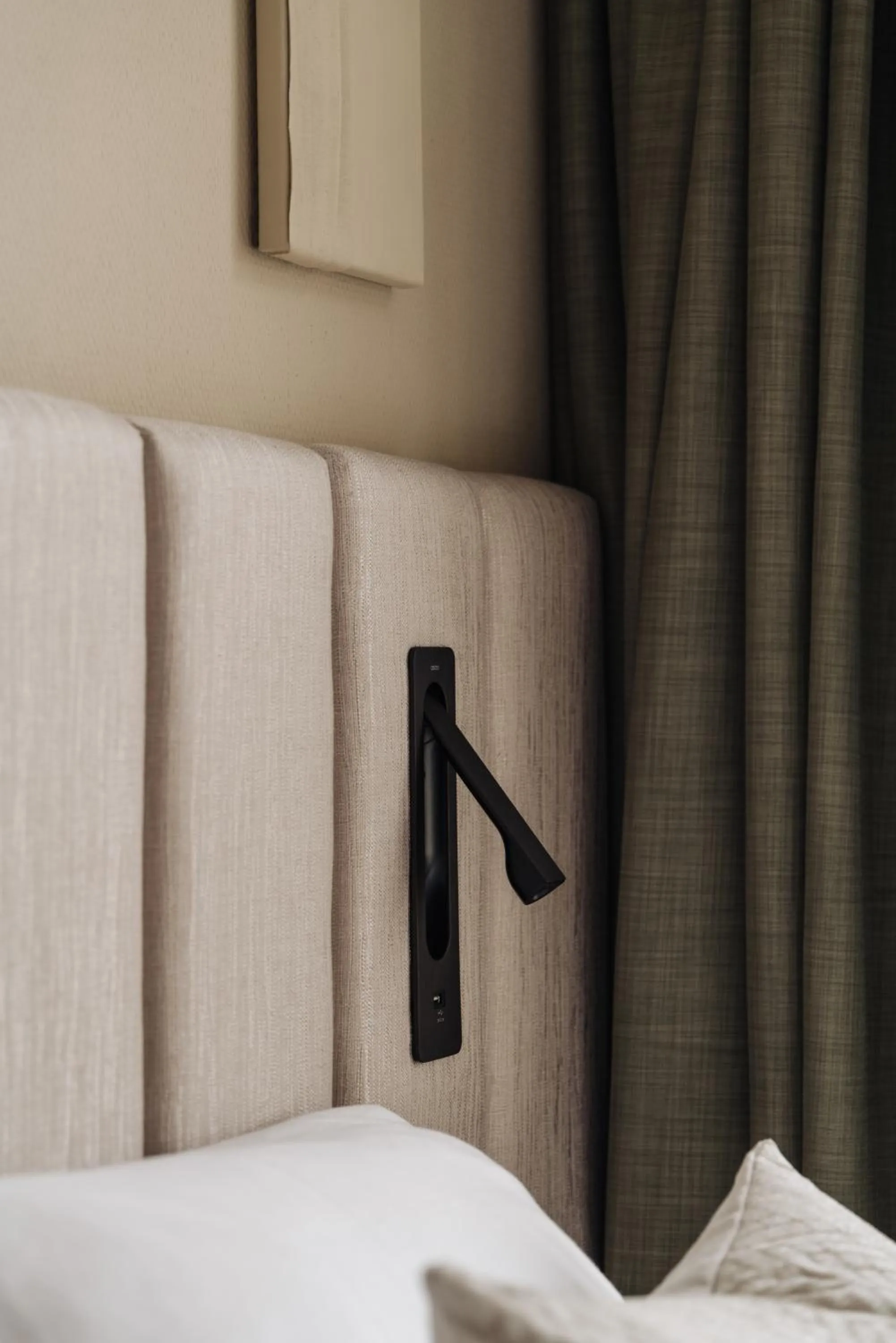 Bed in Adam Suites Hotel