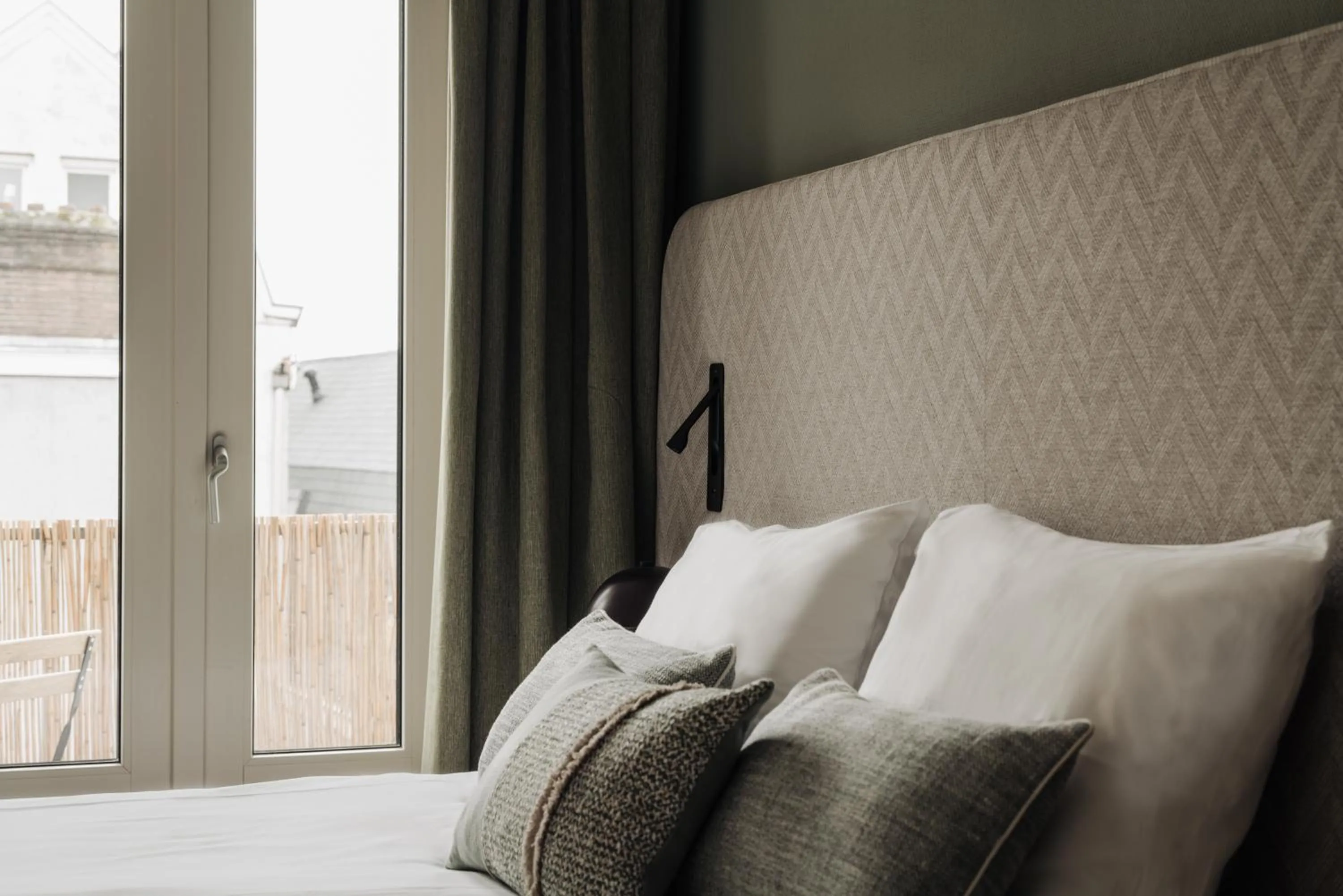 Bed in Adam Suites Hotel