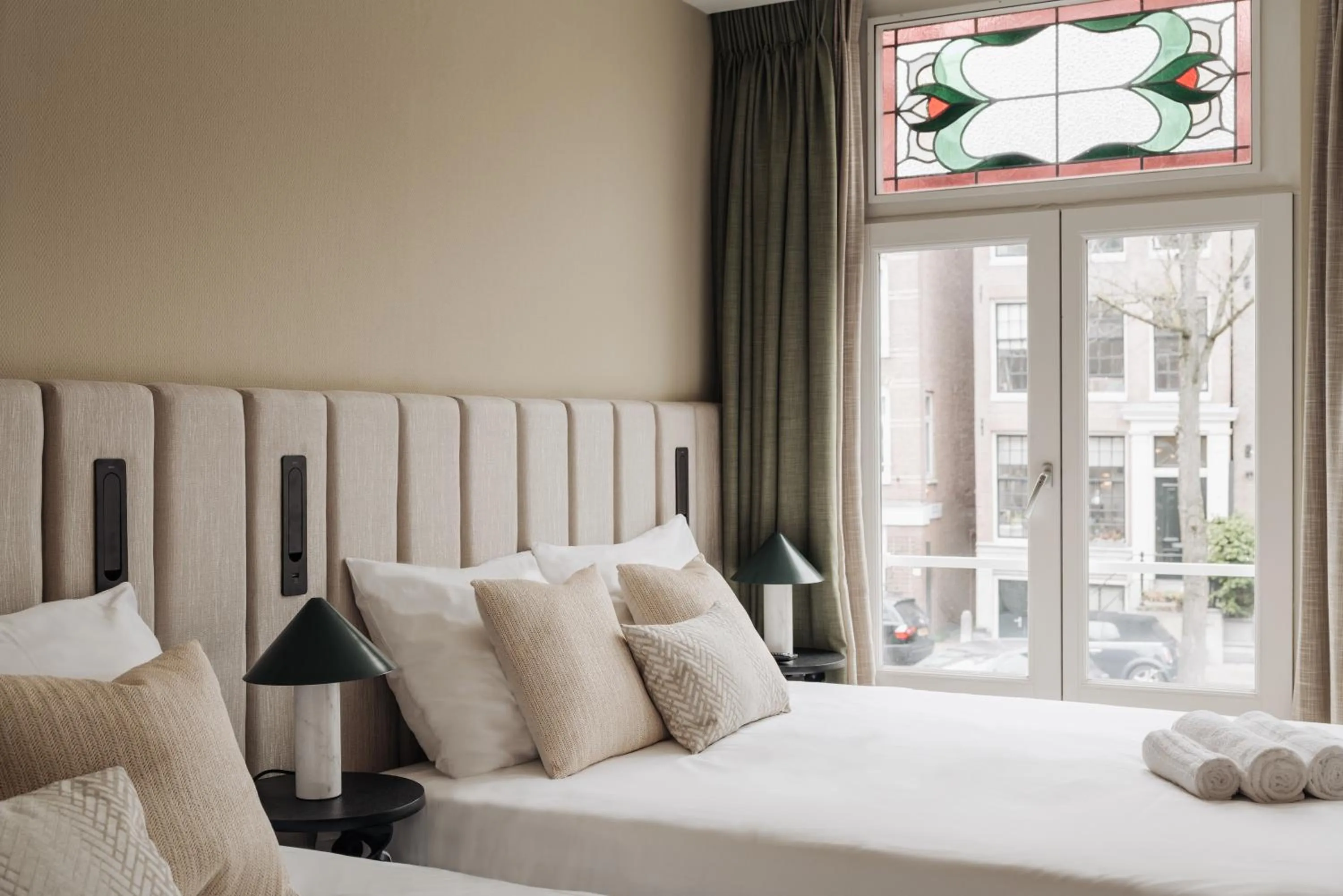 Bed in Adam Suites Hotel