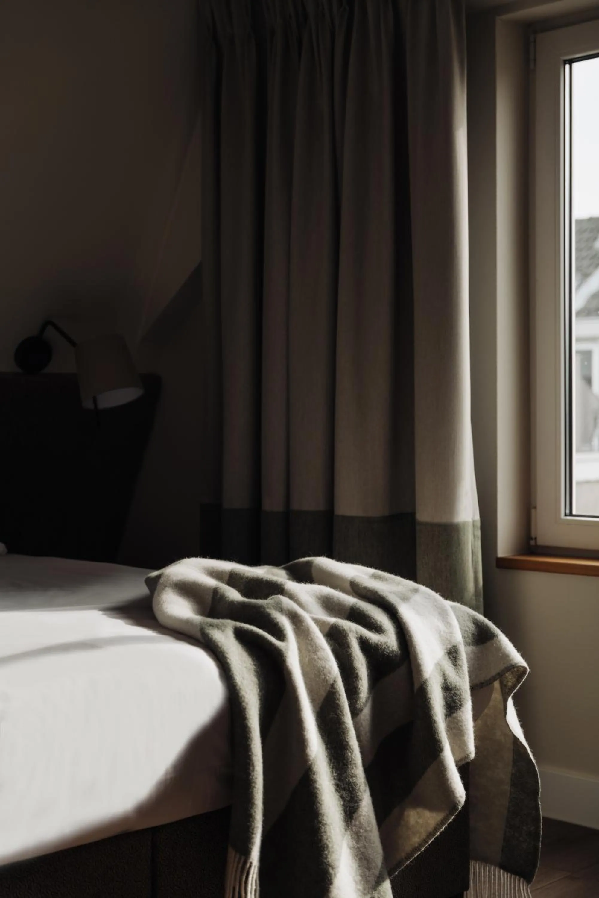 Bed in Adam Suites Hotel