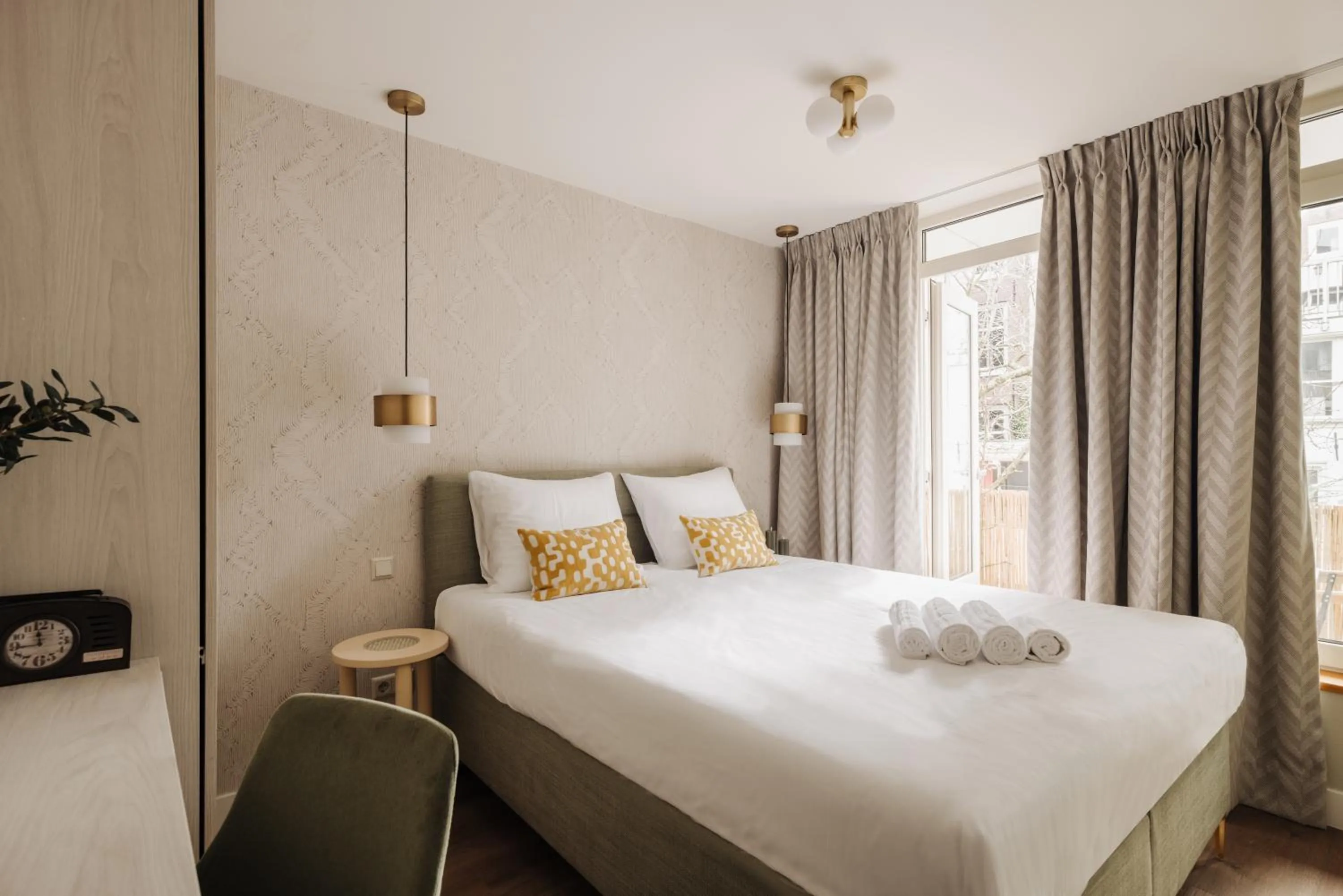 Bed in Adam Suites Hotel