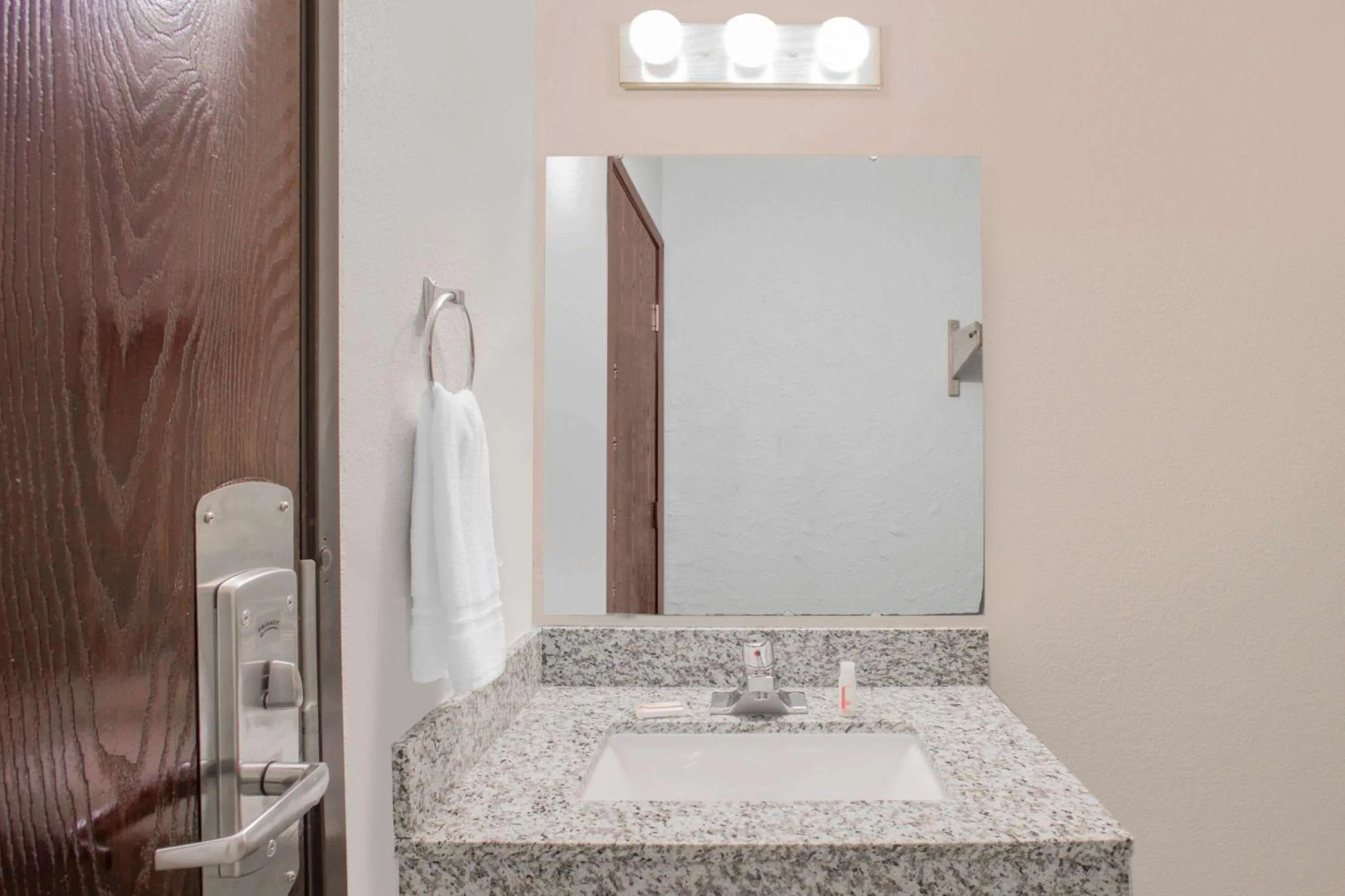 Bathroom in Super 8 by Wyndham Windsor/Madison North