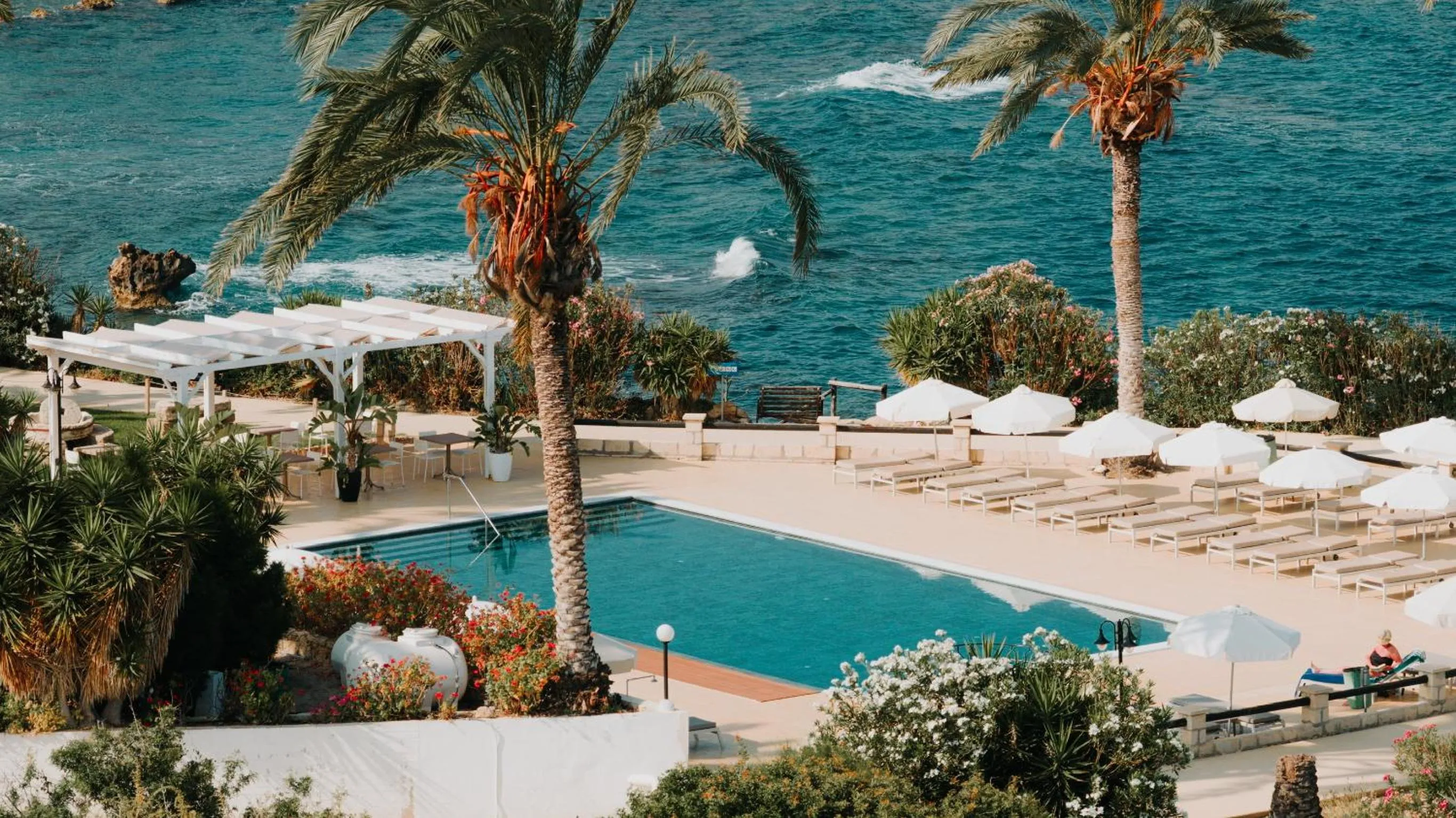 Swimming pool in Vrachia Beach Hotel & Suites - Adults Only