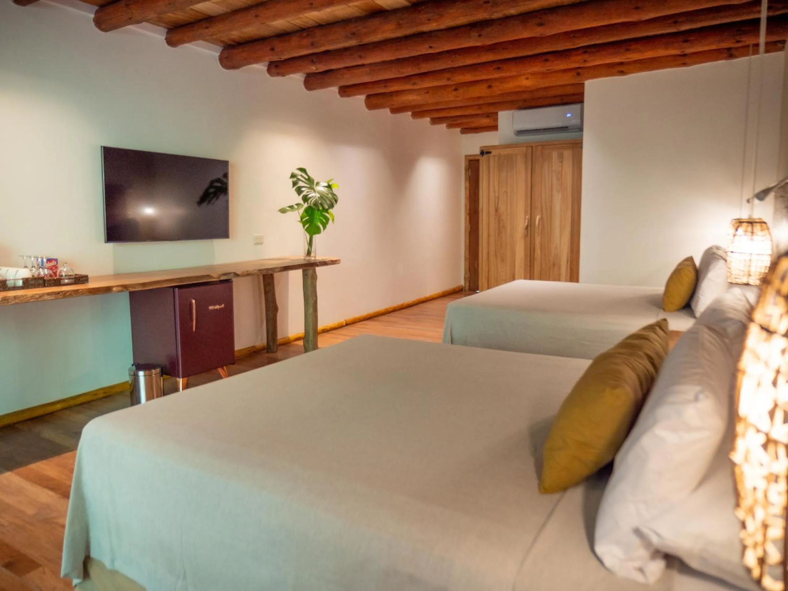 Bed in La Aldea De La Selva Lodge