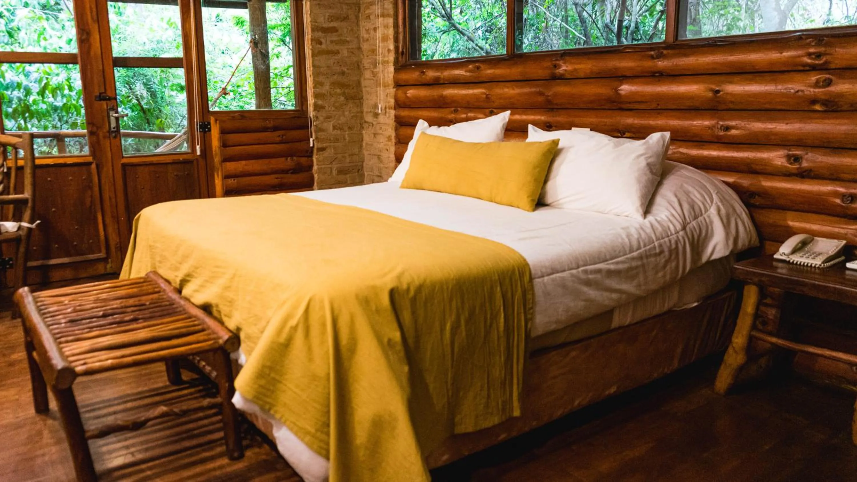 Bed in La Aldea De La Selva Lodge