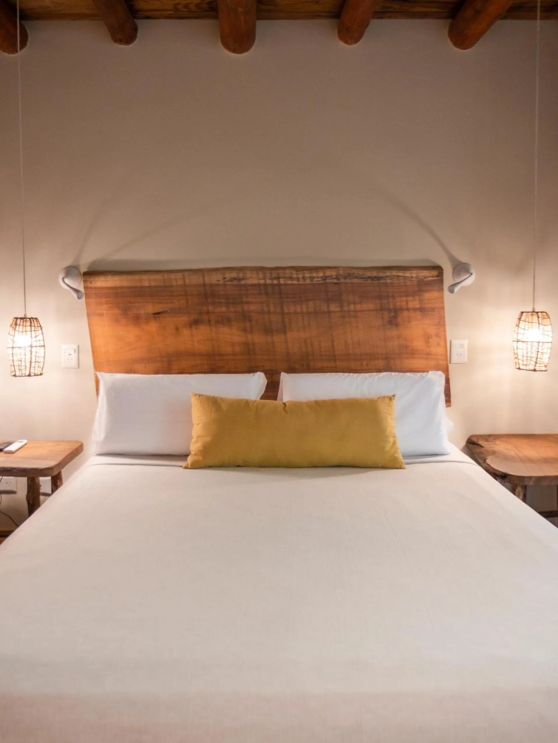 Bed in La Aldea De La Selva Lodge