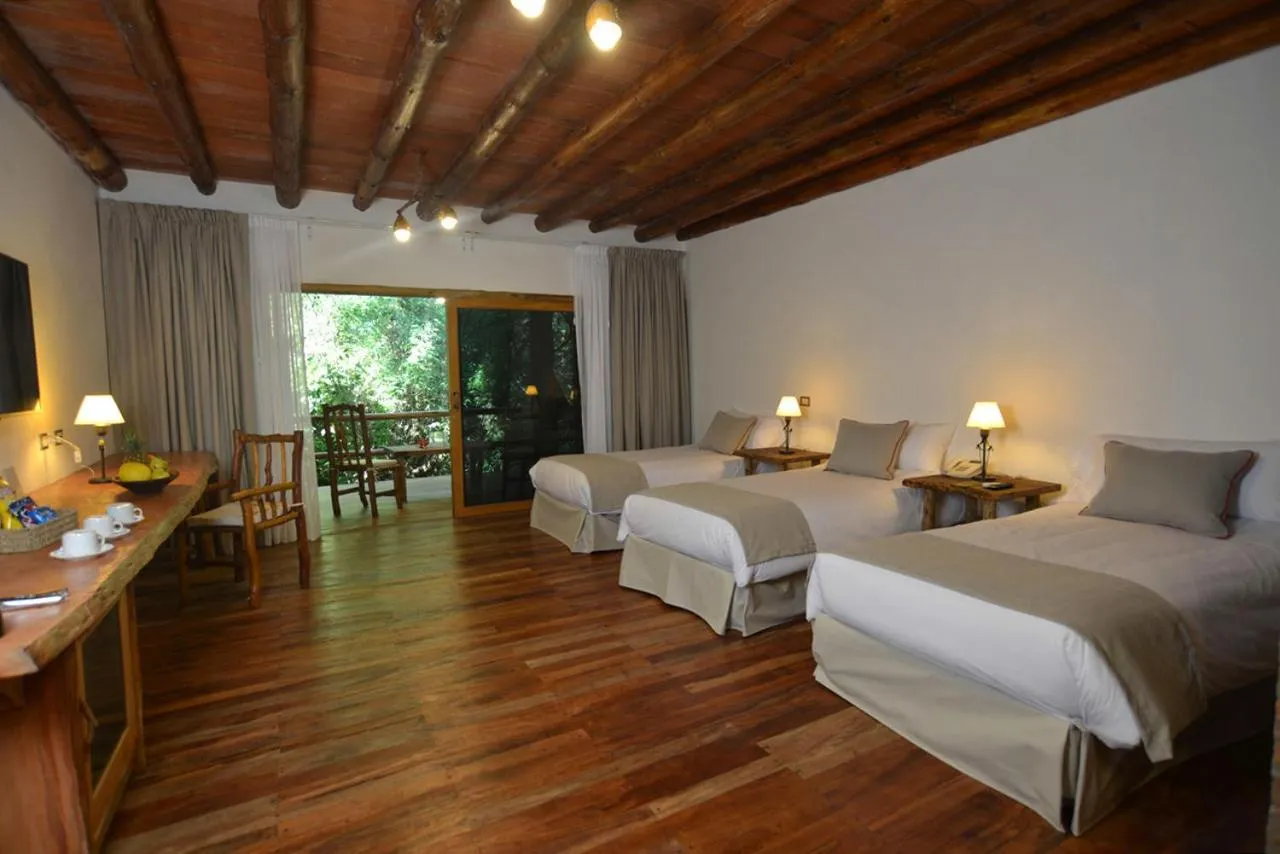 Photo of the whole room, Bed in La Aldea De La Selva Lodge