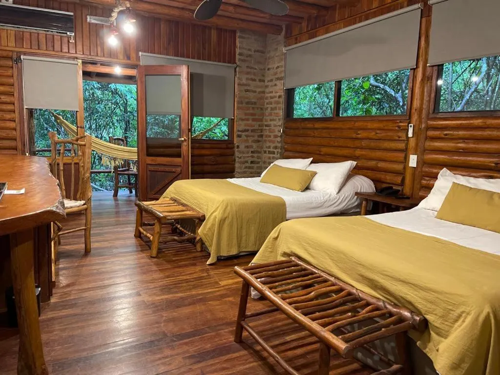Bed in La Aldea De La Selva Lodge