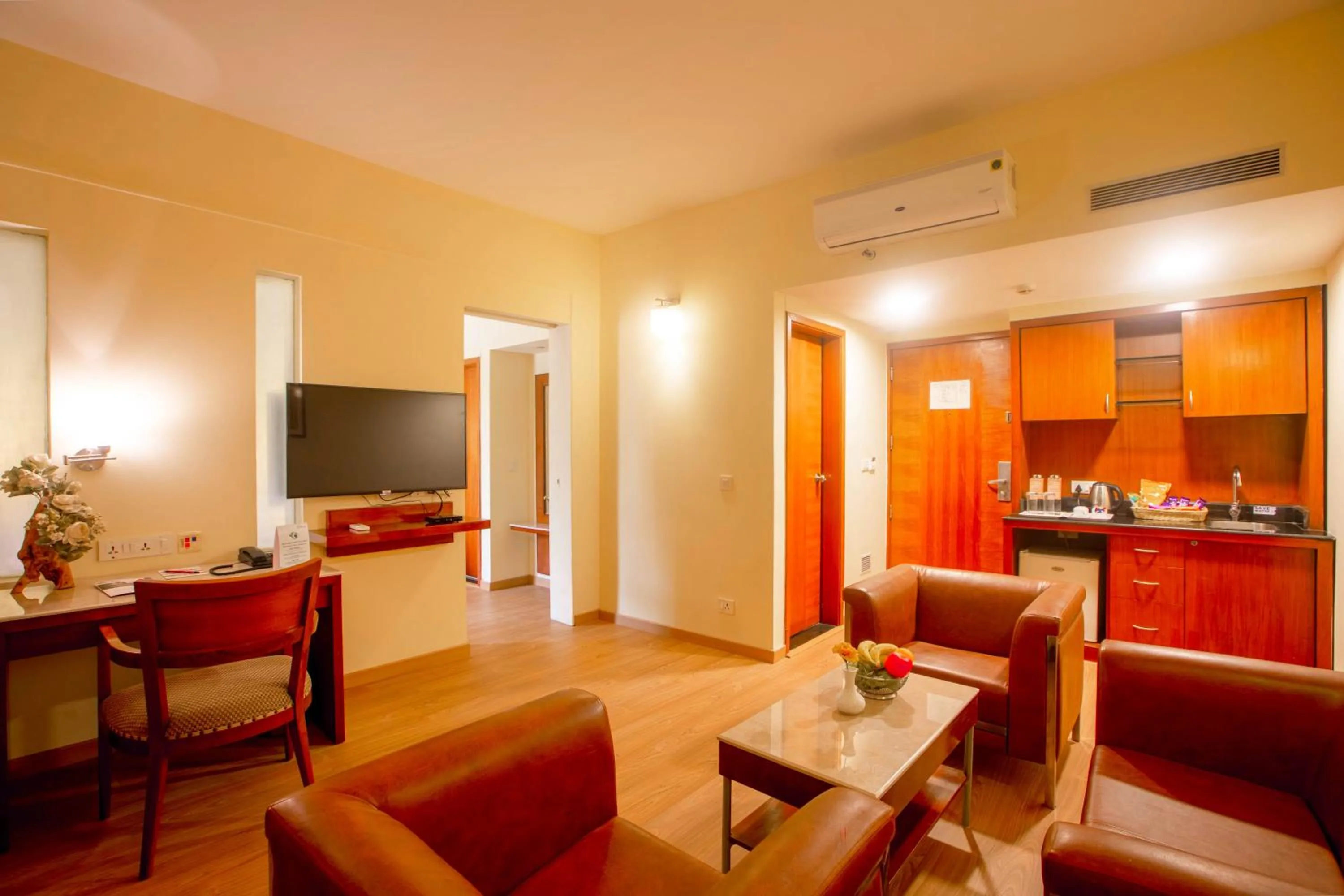 Communal lounge/ TV room in Evoma