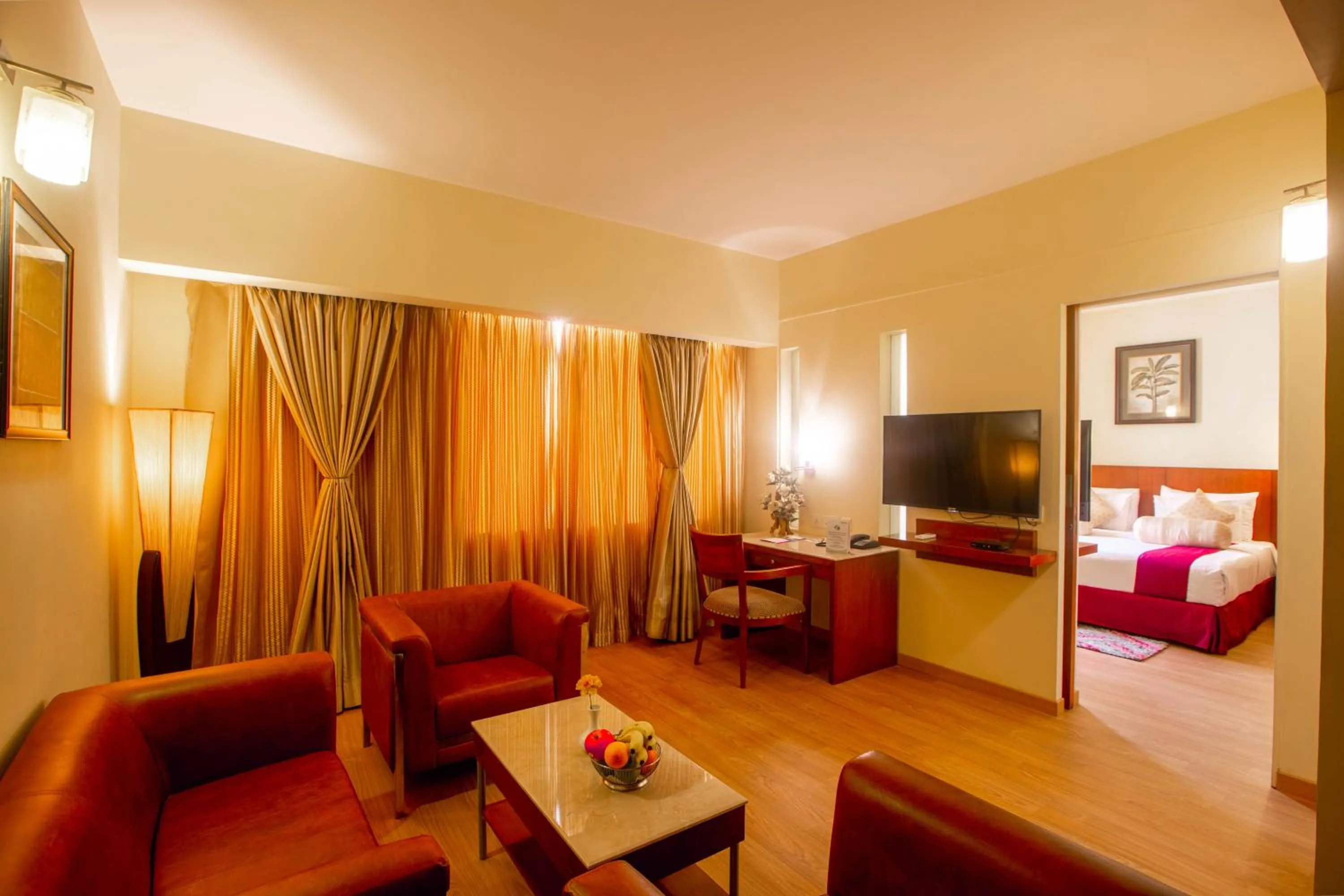 Communal lounge/ TV room, Bed in Evoma