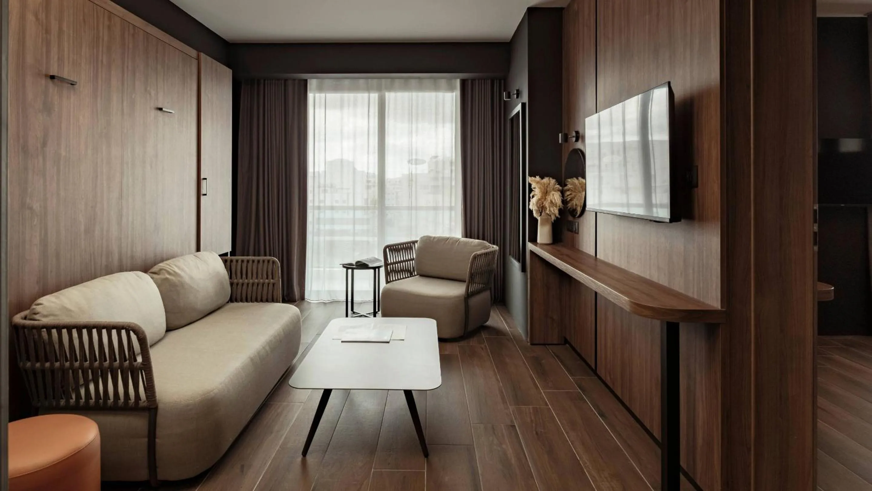 Seating area in AX ODYCY Hotel