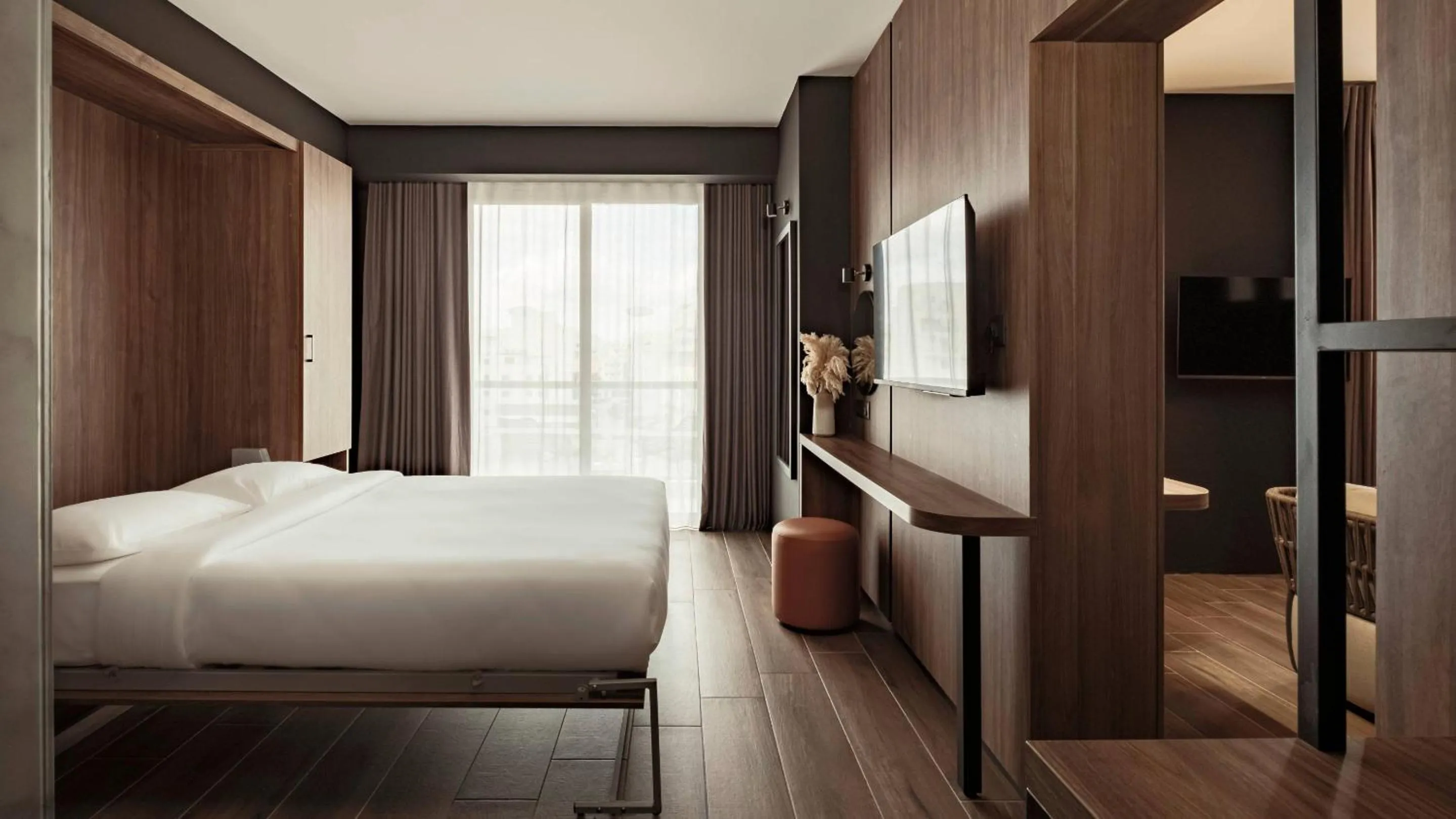 Bed in AX ODYCY Hotel