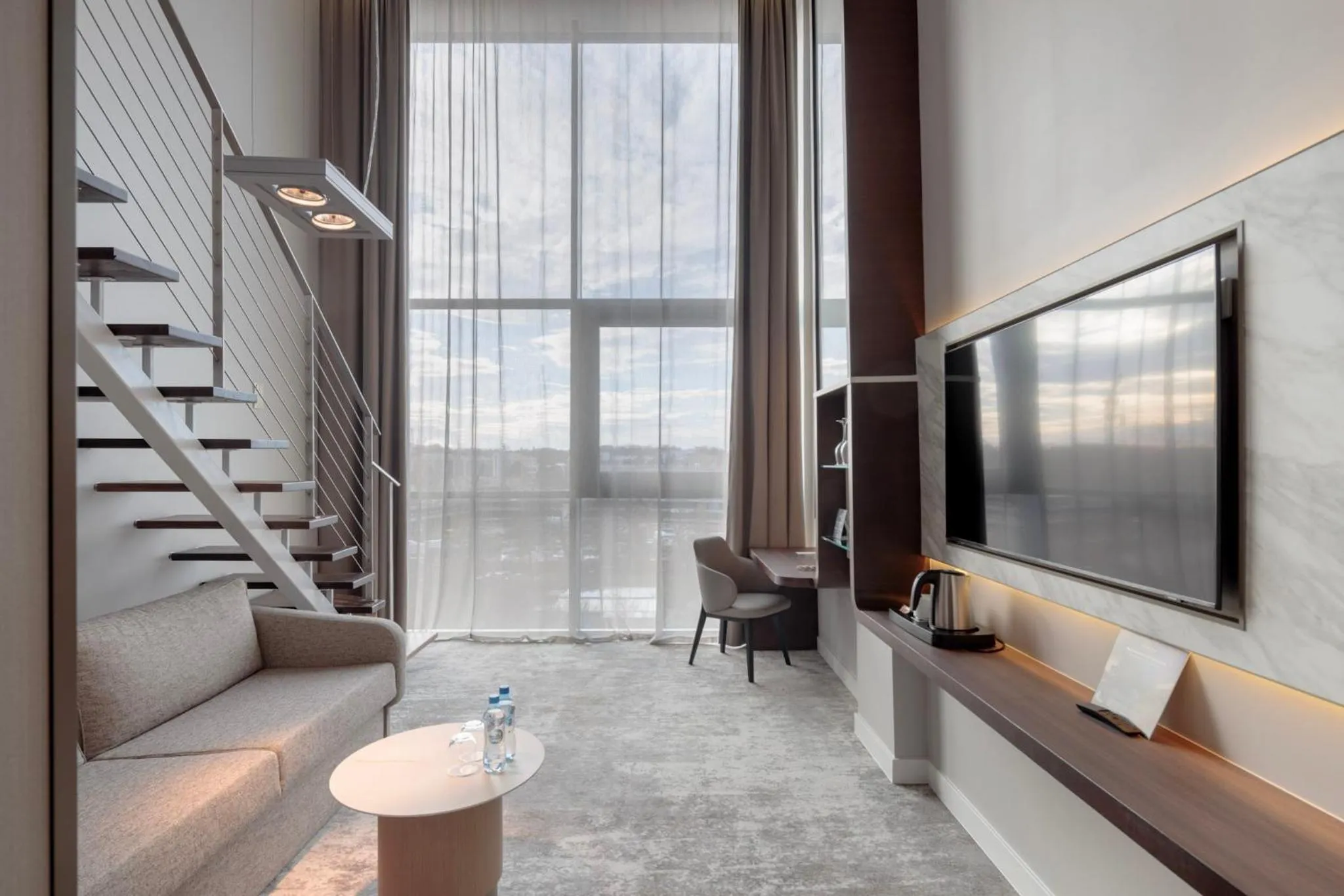 Living room in Marine Hotel by Zdrojowa