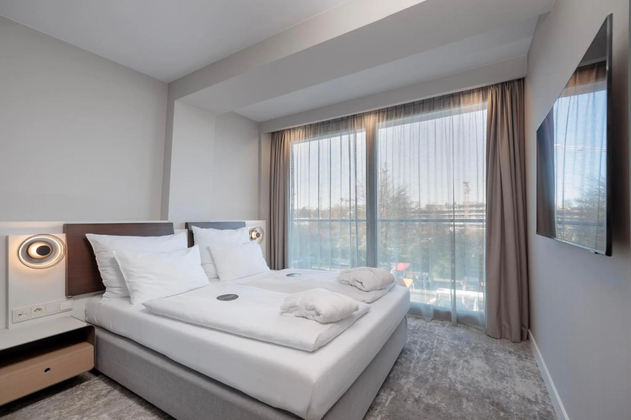 Bed in Marine Hotel by Zdrojowa