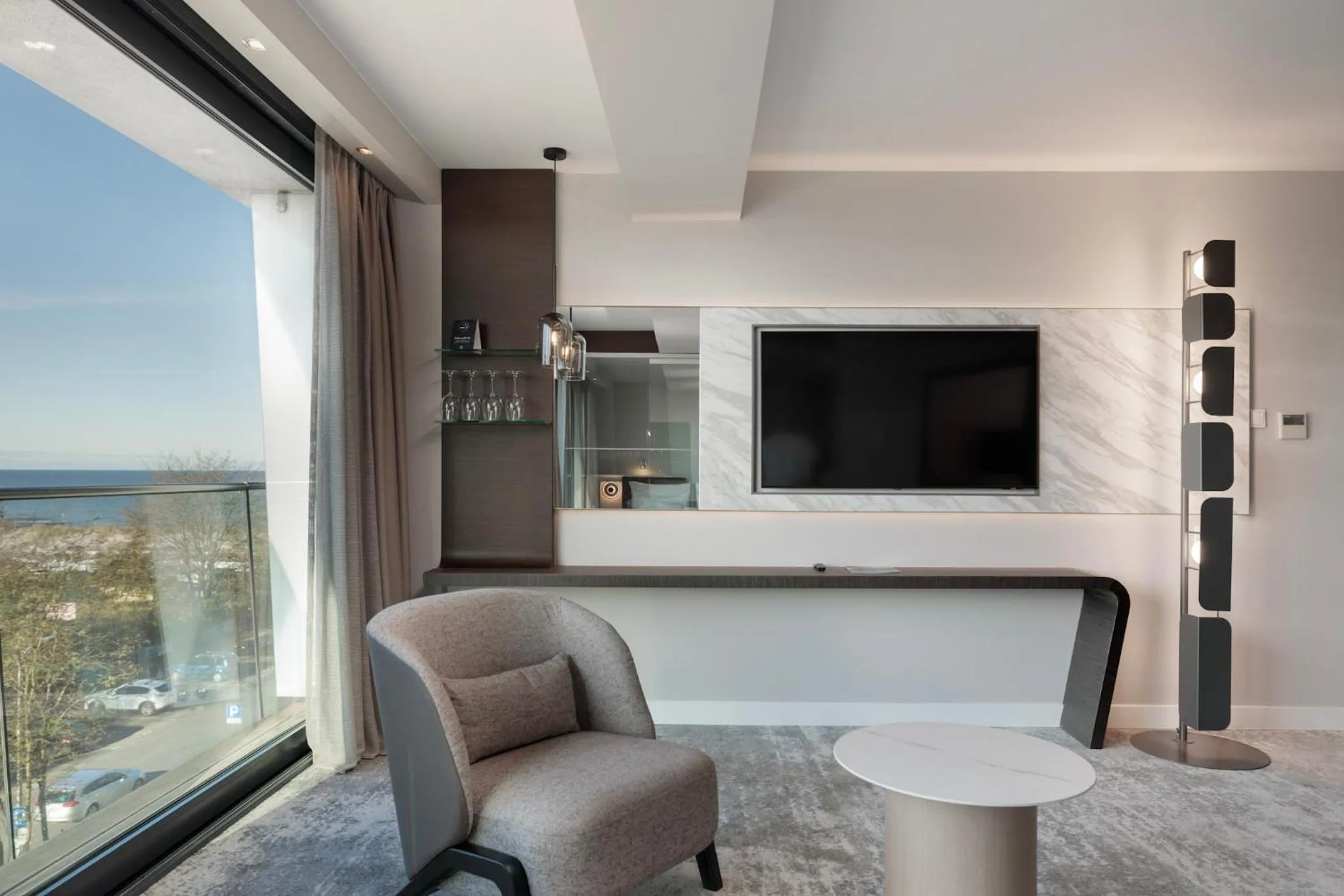 Living room in Marine Hotel by Zdrojowa