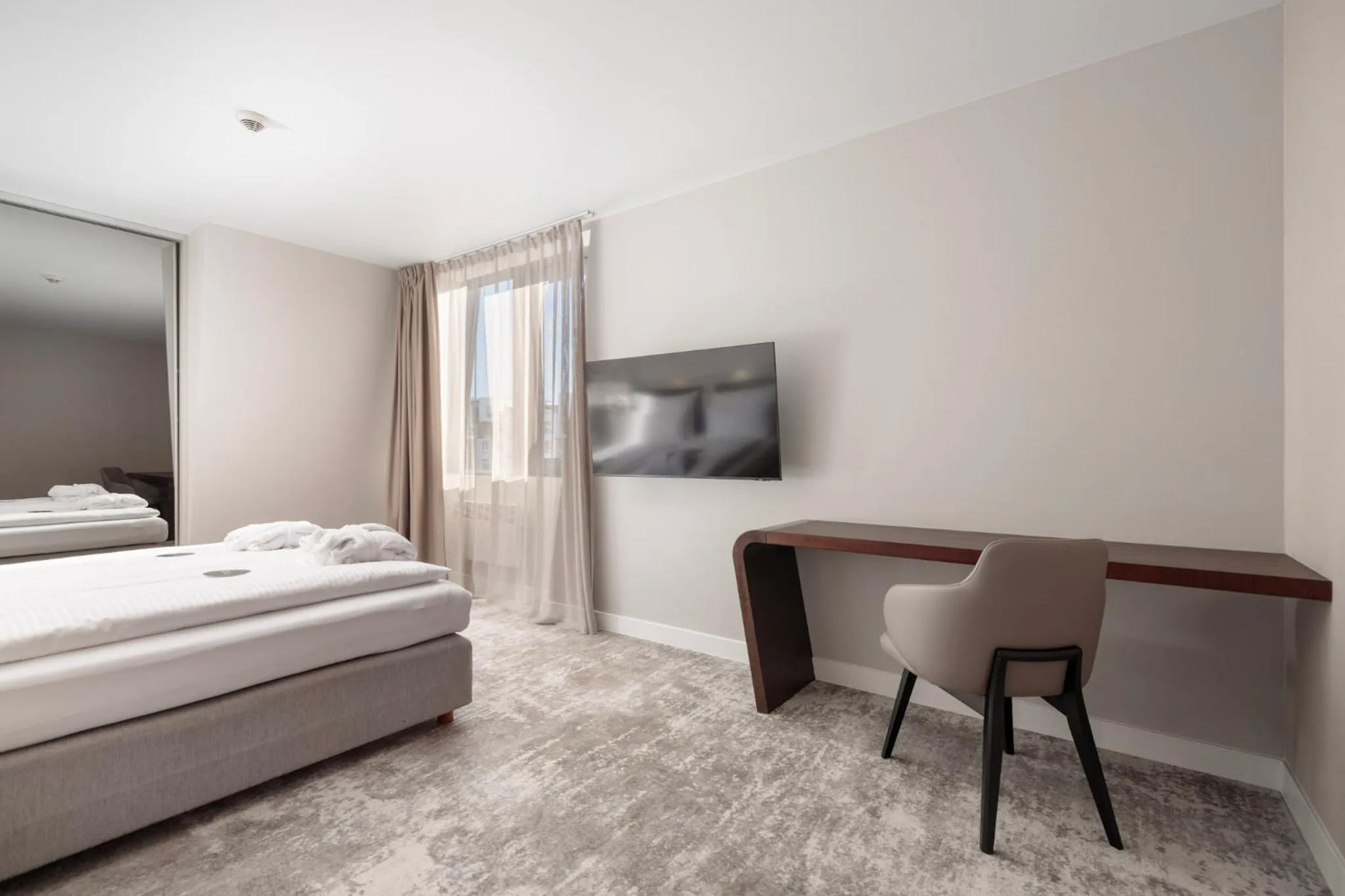 Bed in Marine Hotel by Zdrojowa