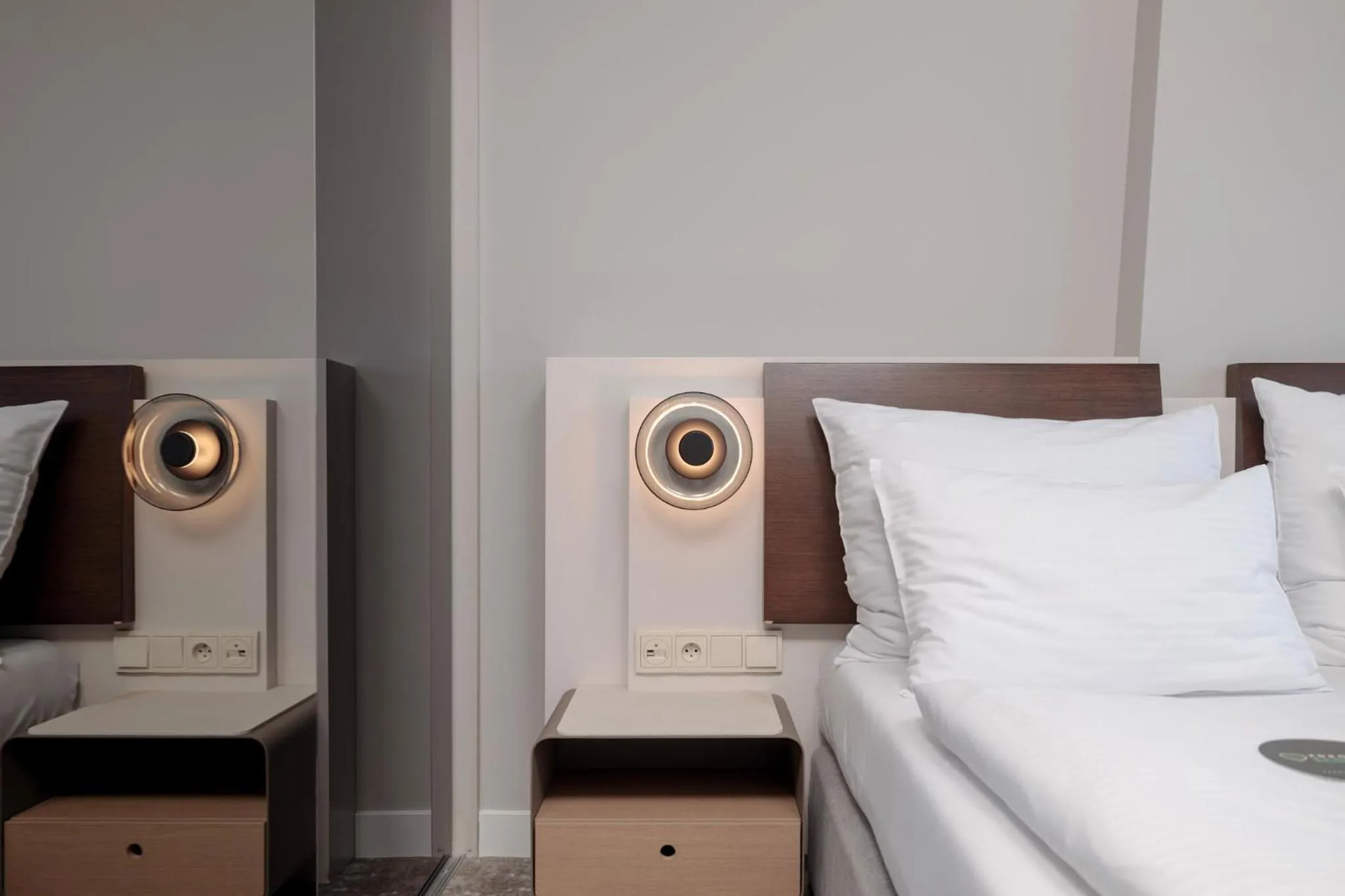 Bed in Marine Hotel by Zdrojowa