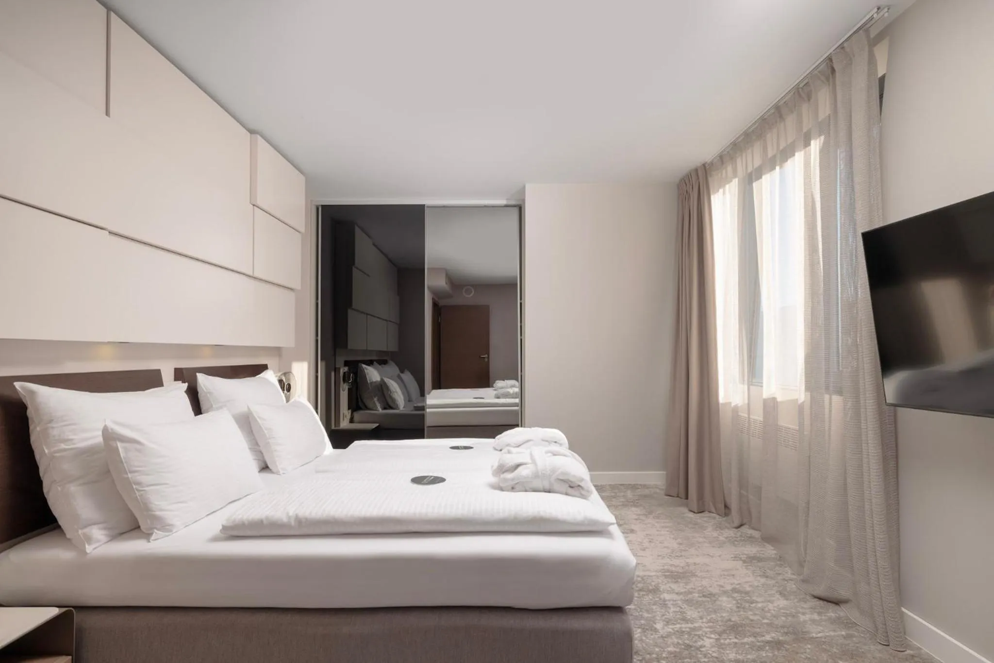 Bed in Marine Hotel by Zdrojowa