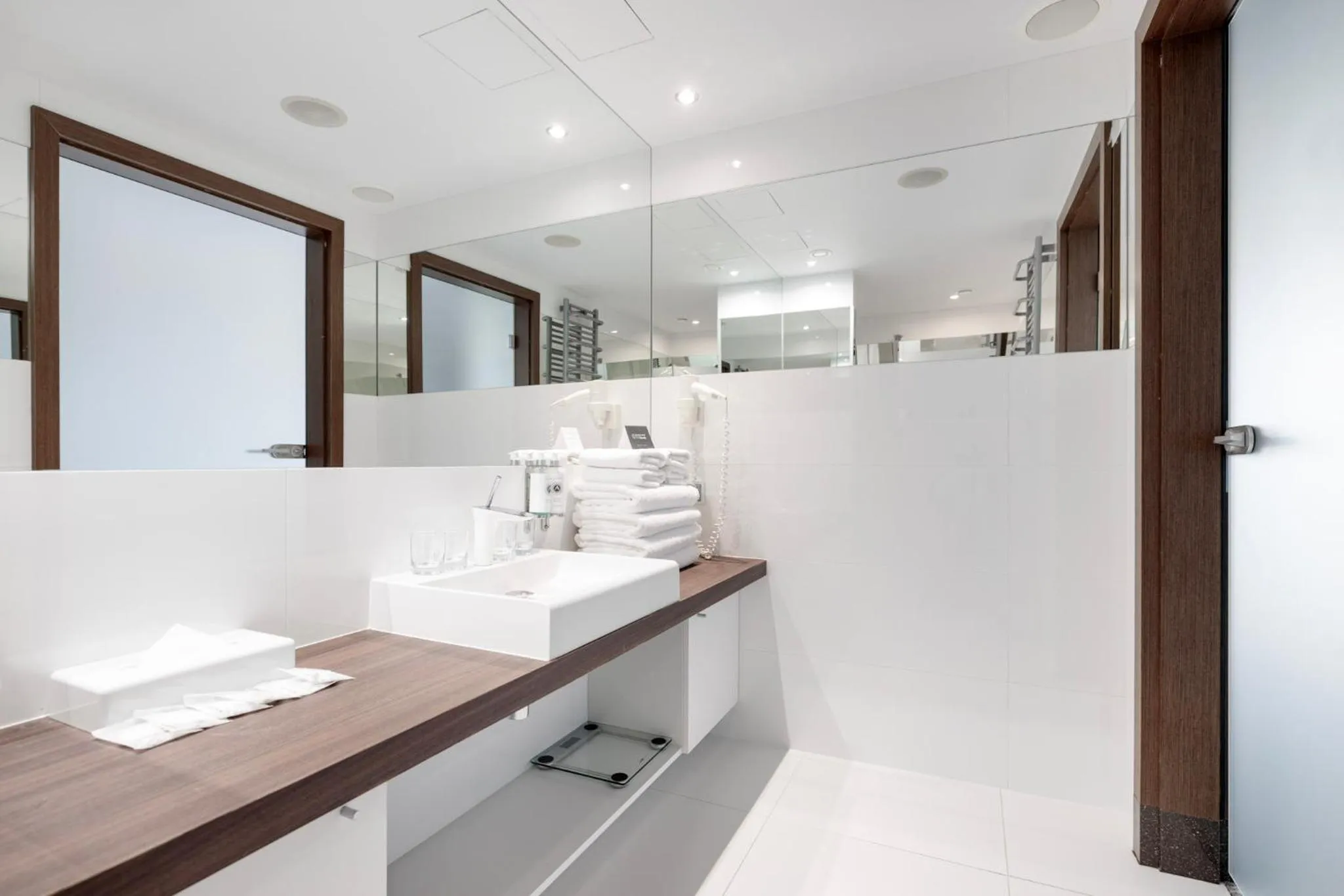 Bathroom in Marine Hotel by Zdrojowa