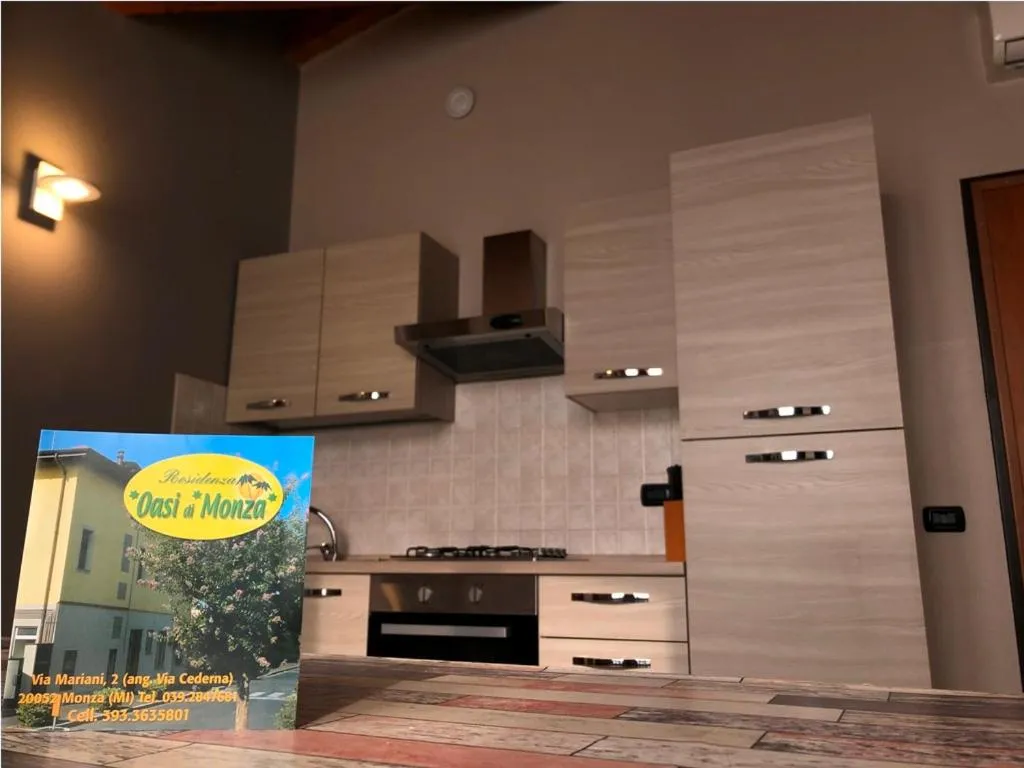 Kitchen or kitchenette in Residence Oasi Di Monza