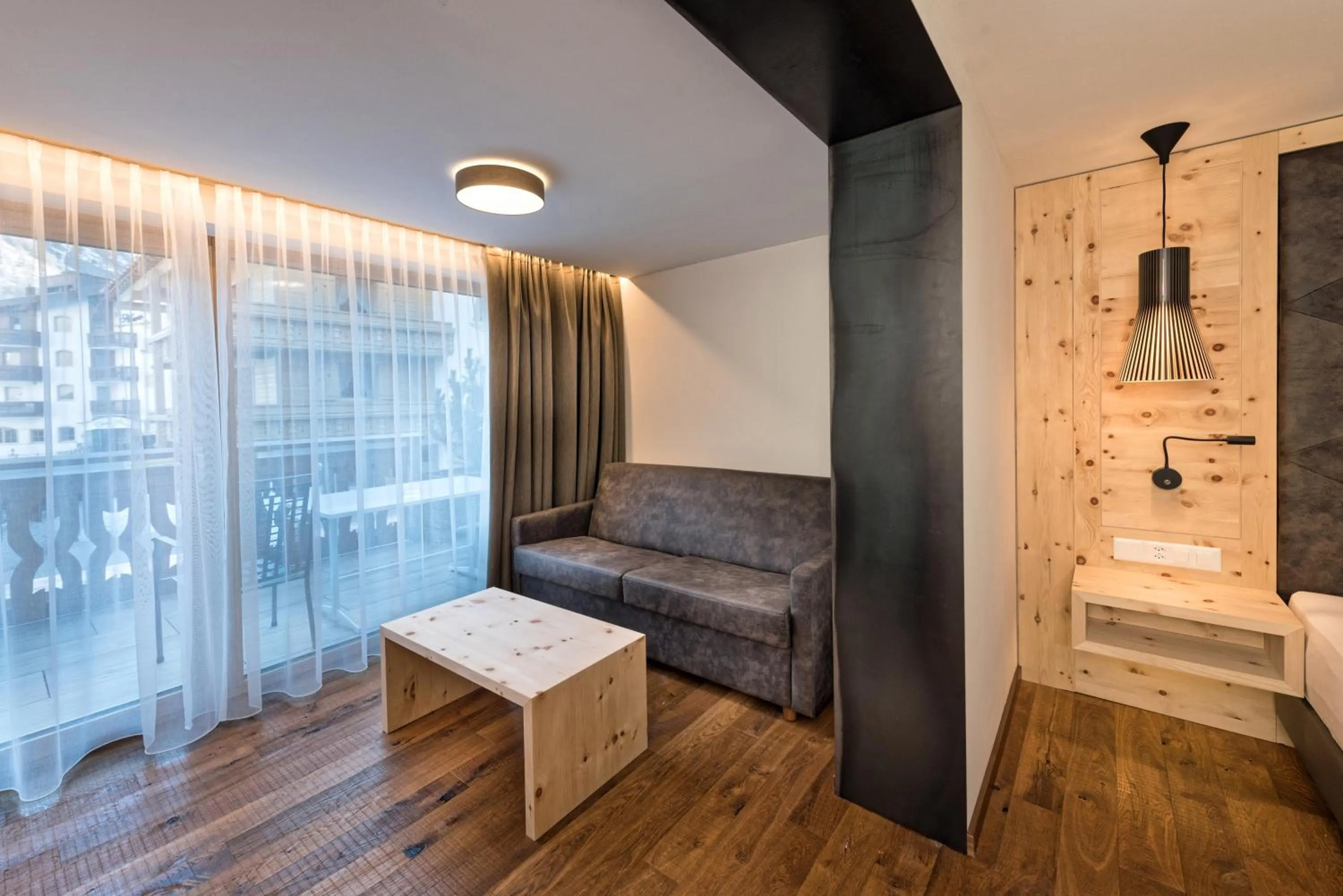 Seating area in Hotel des Alpes