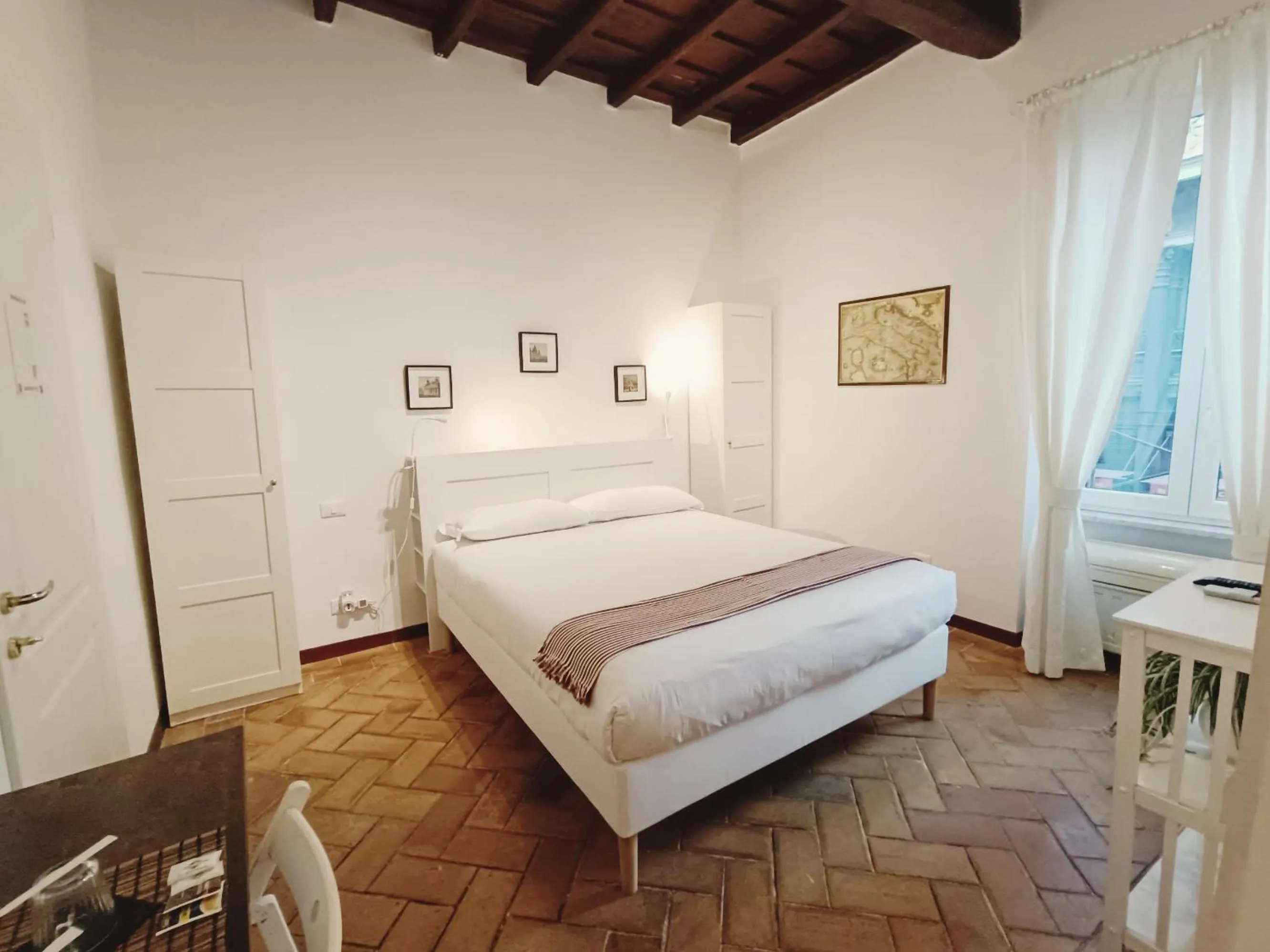 Bed in Piccolo Trevi Suites