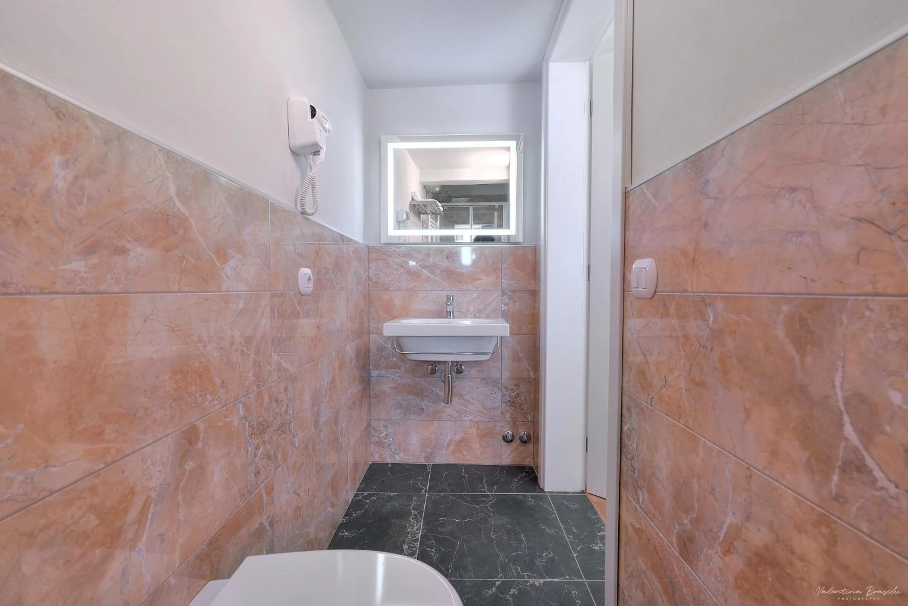 Bathroom in Hotel Cosmos