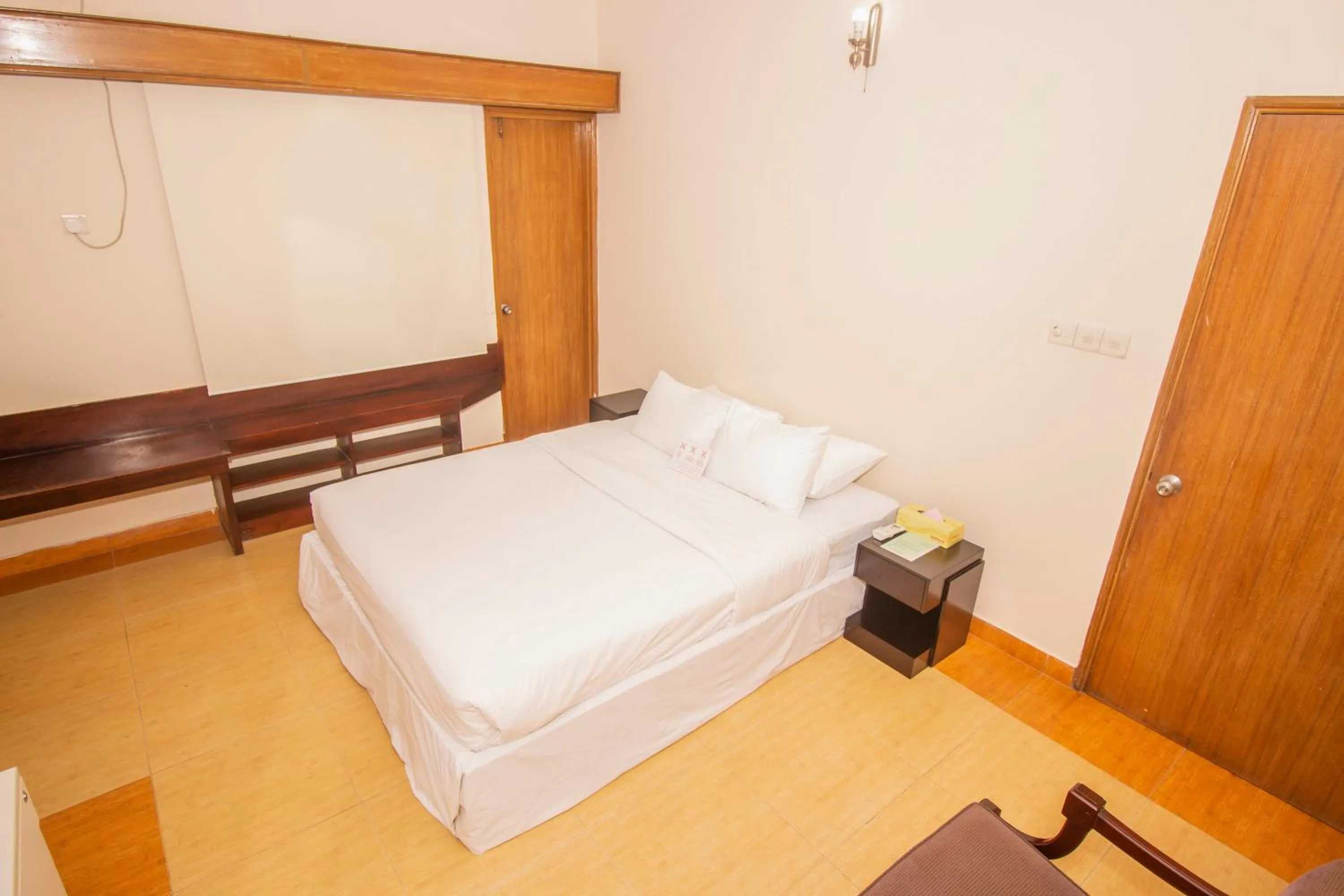 Living room, Bed in Rafflesia Serviced Apartments