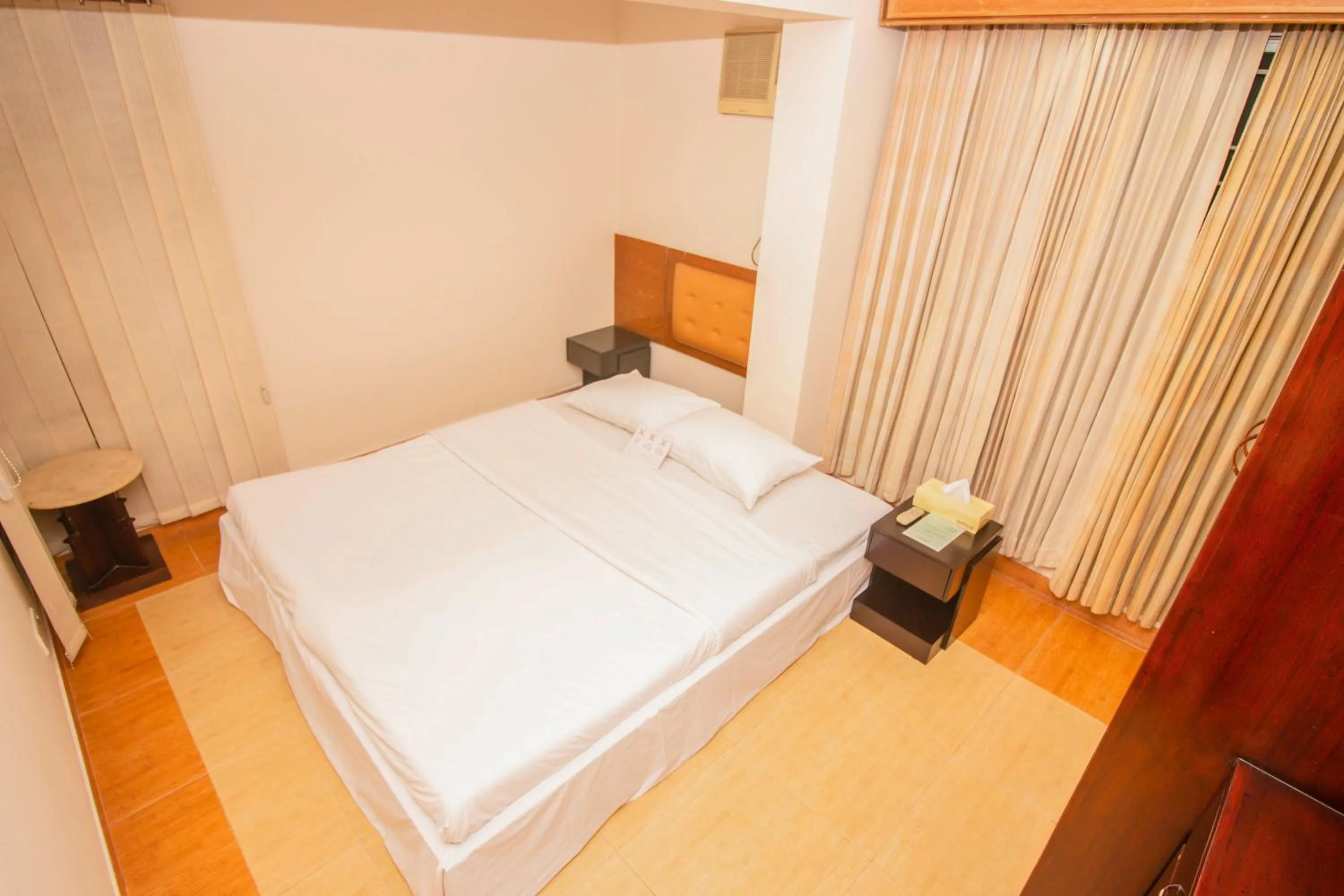 Bedroom, Bed in Rafflesia Serviced Apartments