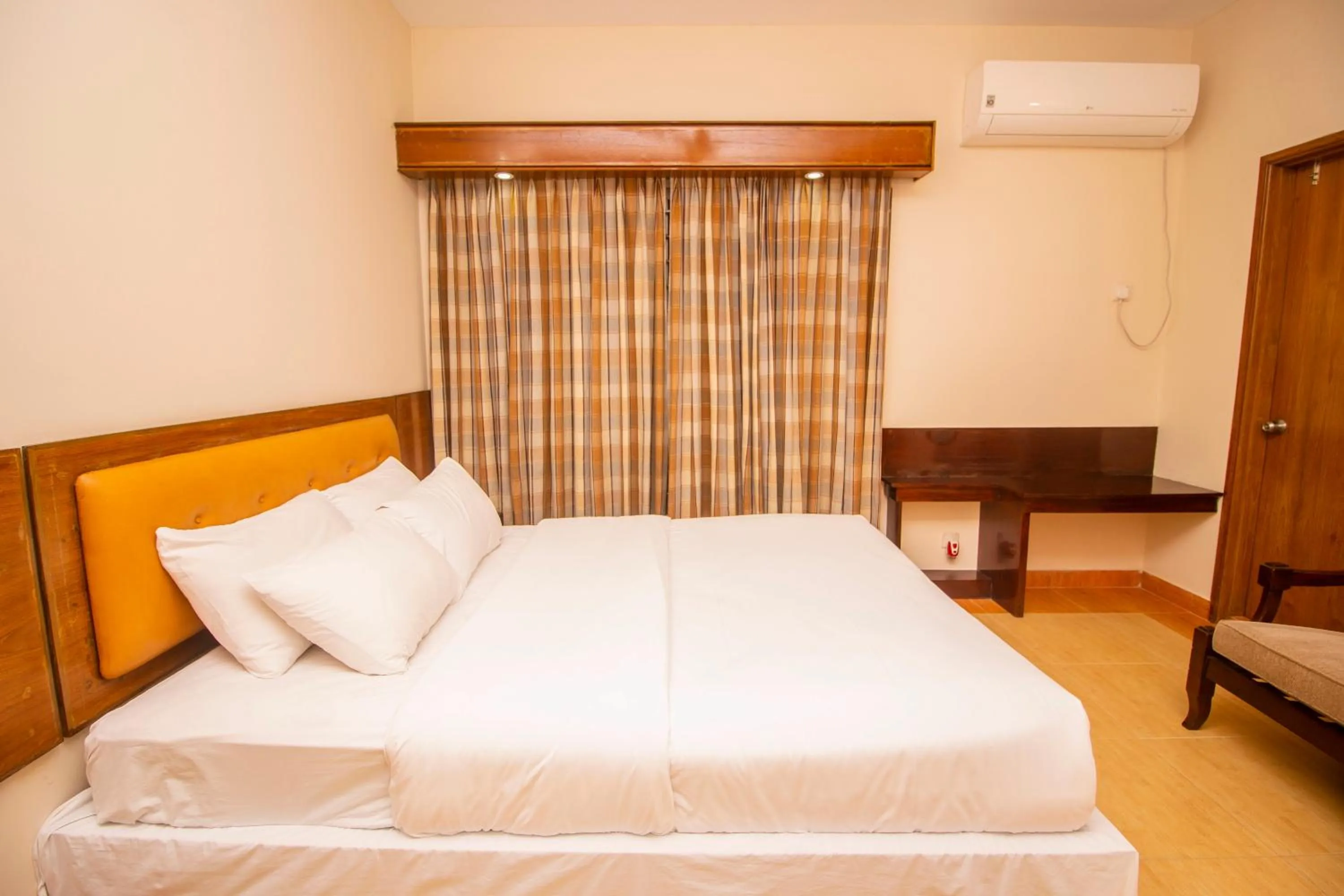 Living room, Bed in Rafflesia Serviced Apartments