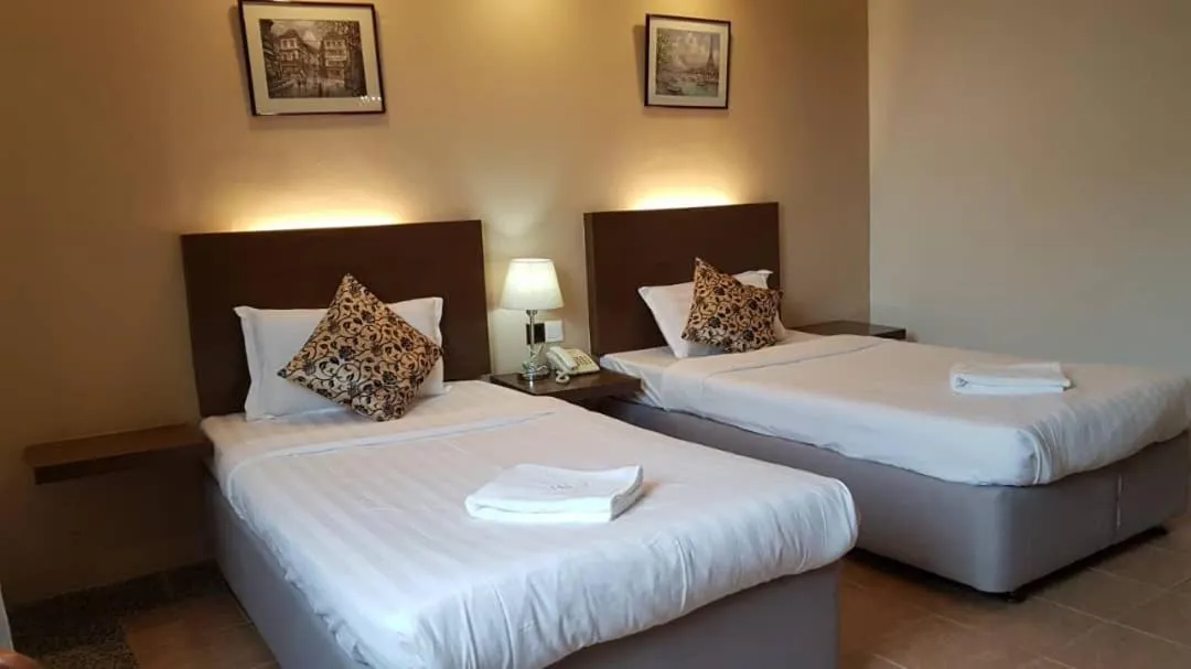 Bed in Eagle Bay Hotel