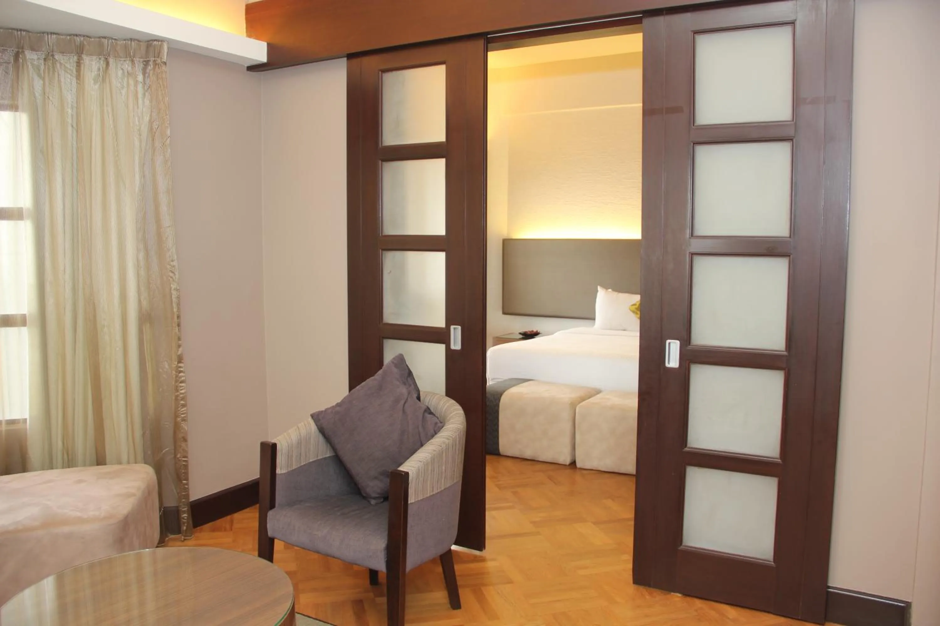 Seating area, Bed in Thistle Port Dickson Resort