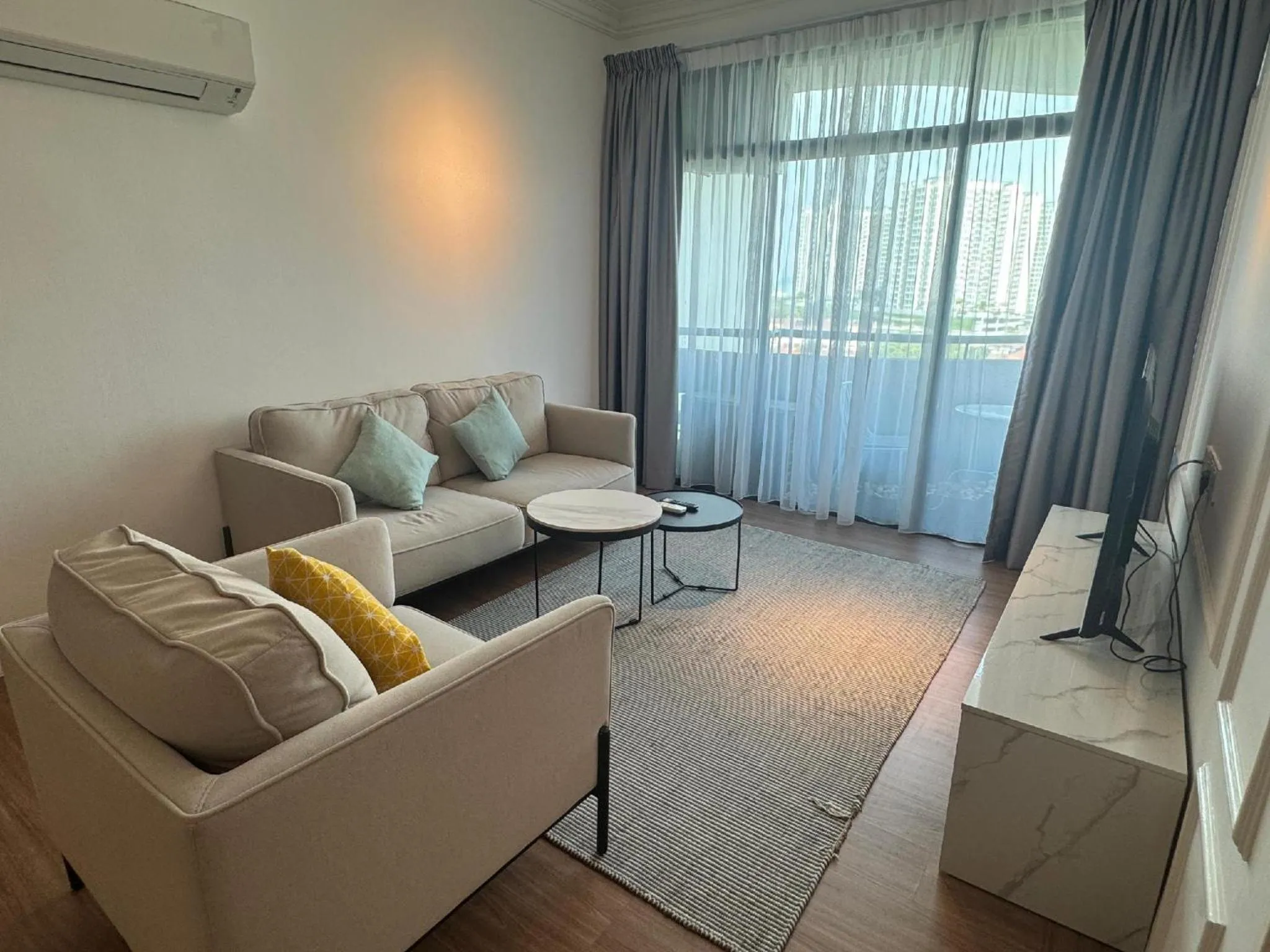 Living room in Century Bay Private Residences