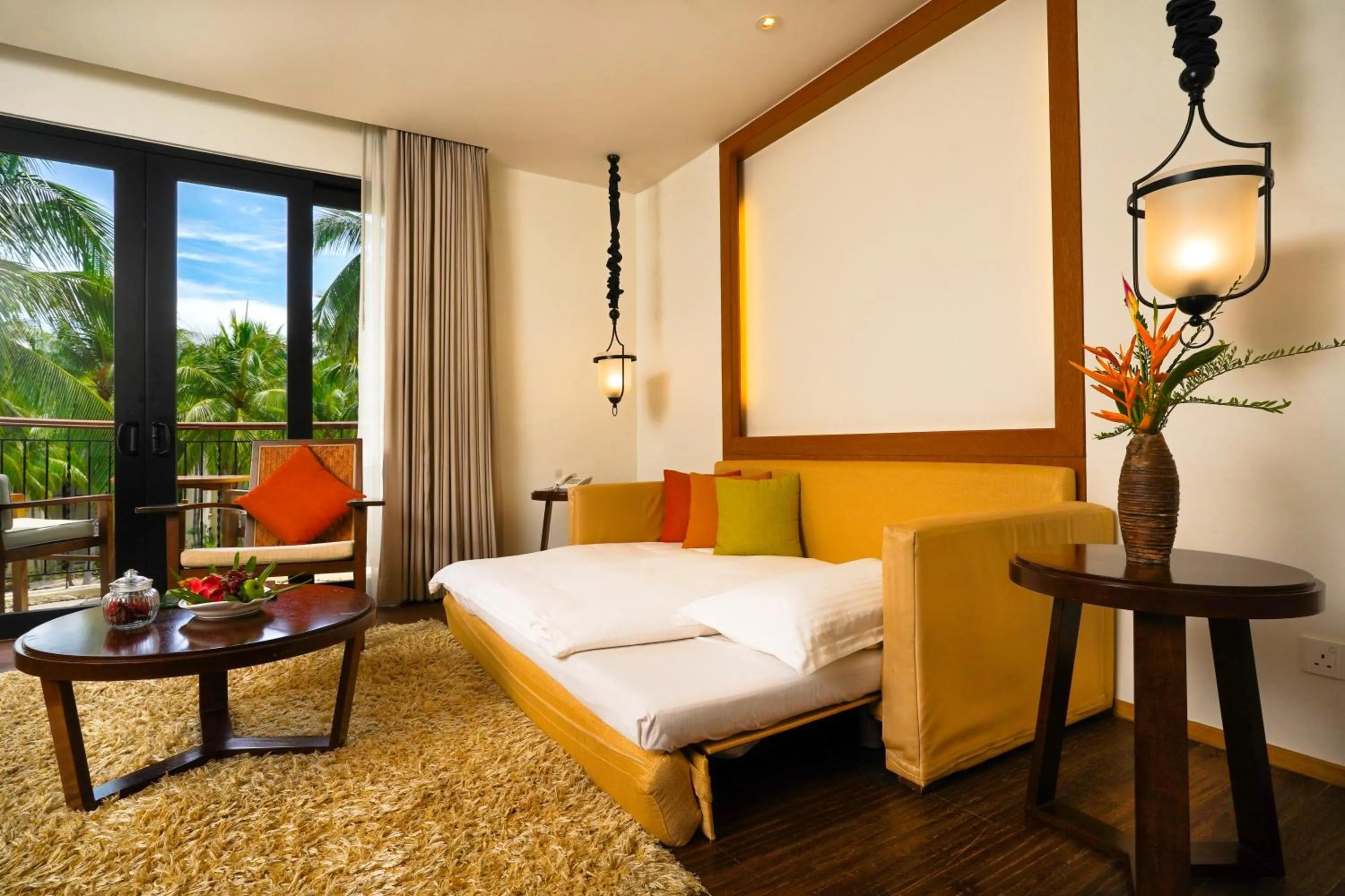 Living room, Bed in Tanjung Rhu Resort