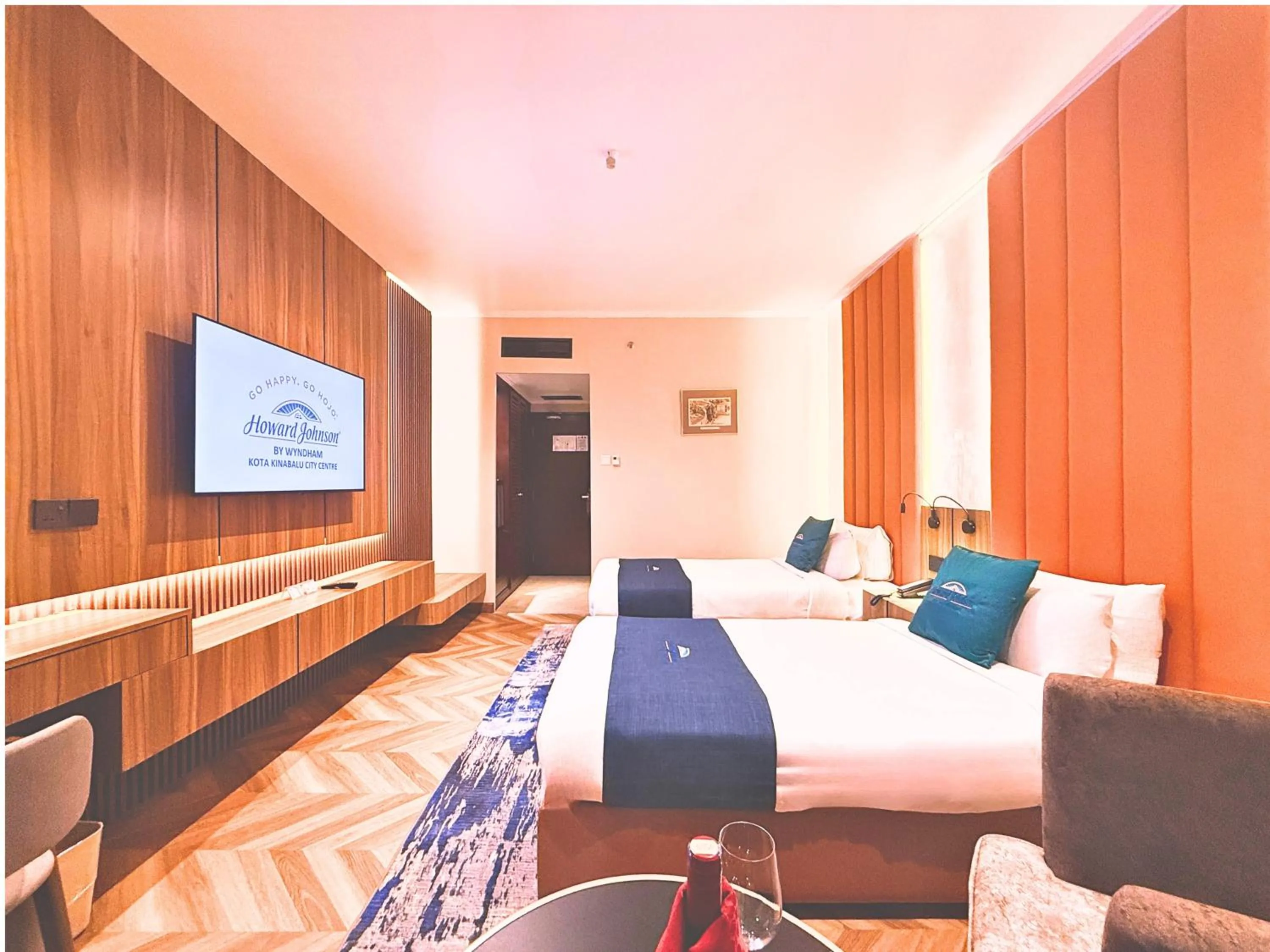 Bed in Howard Johnson by Wyndham Kota Kinabalu City Centre, formerly Hotel Shangri-La Kota Kinabalu