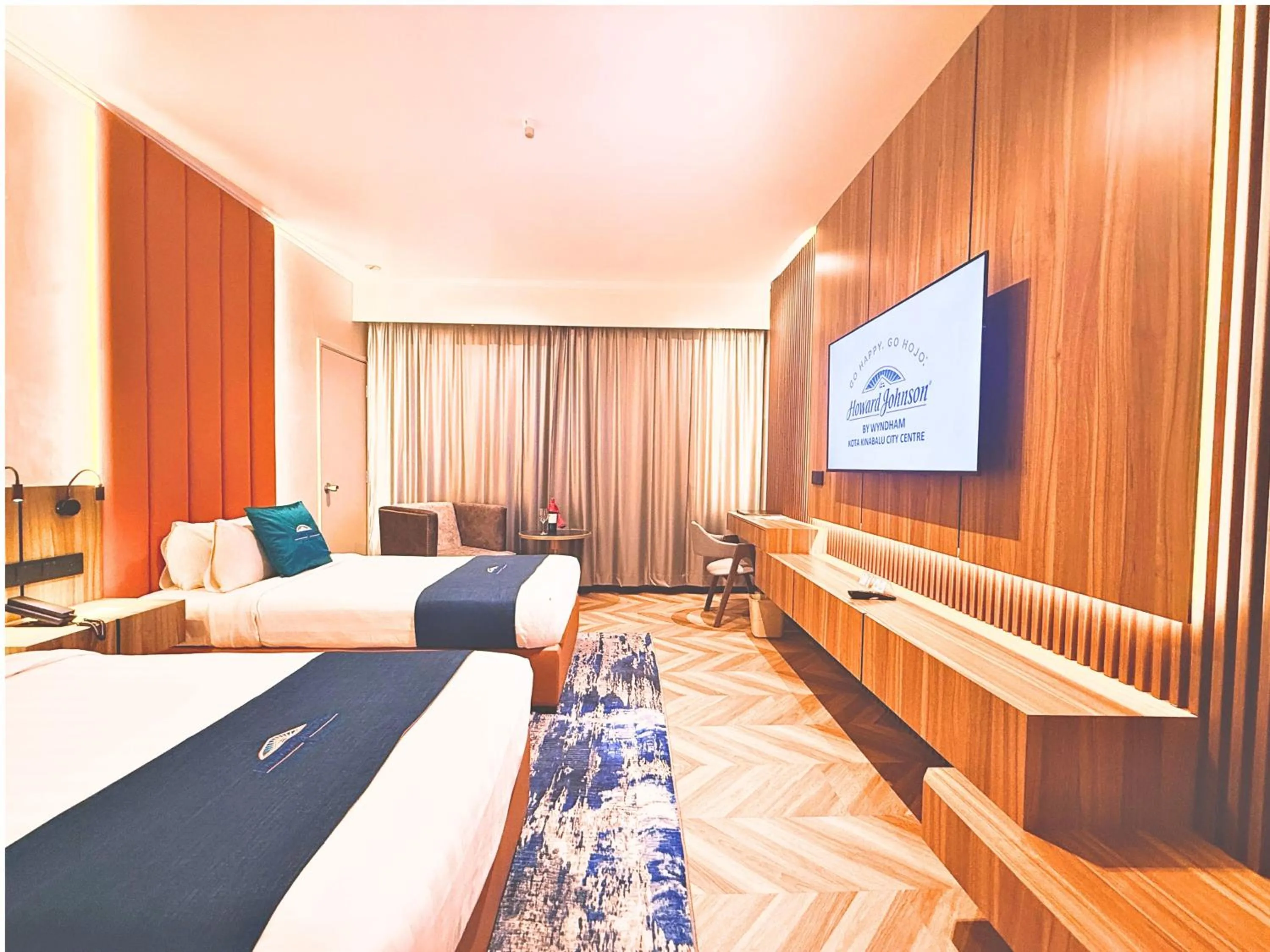 Bed in Howard Johnson by Wyndham Kota Kinabalu City Centre, formerly Hotel Shangri-La Kota Kinabalu