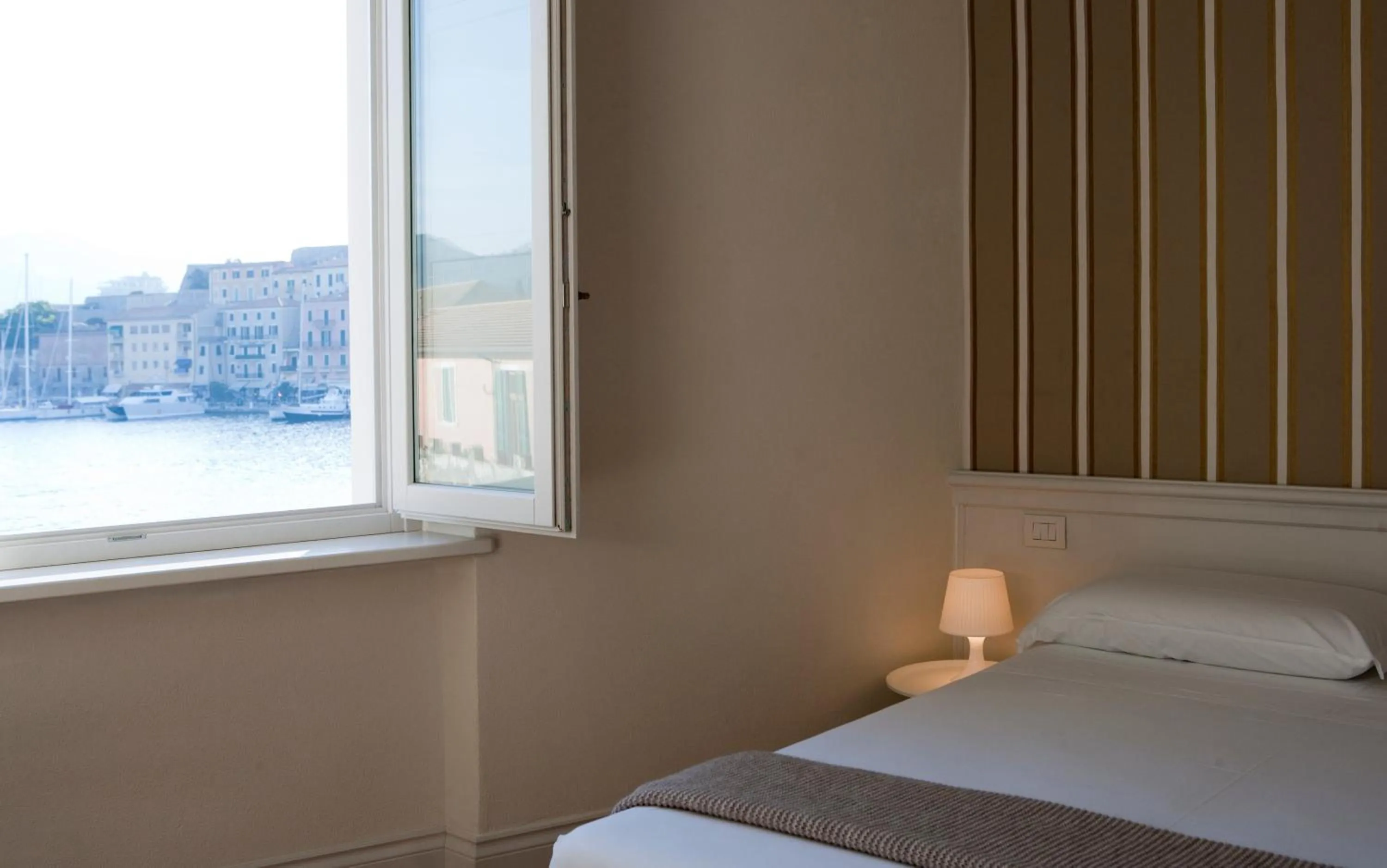 Photo of the whole room, Bed in Porto Sole Rooms