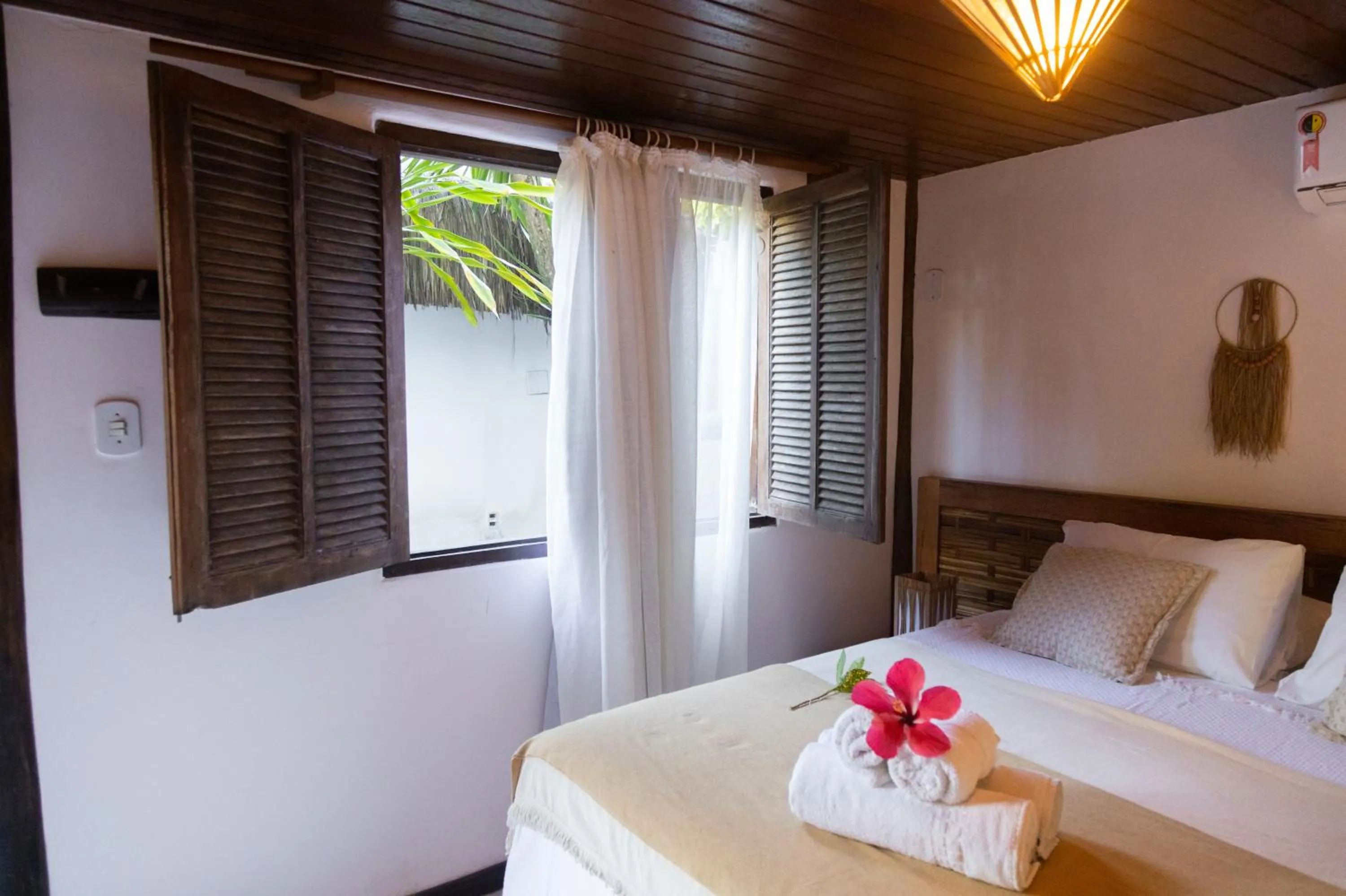 Bed in Pousada Vila do Mar