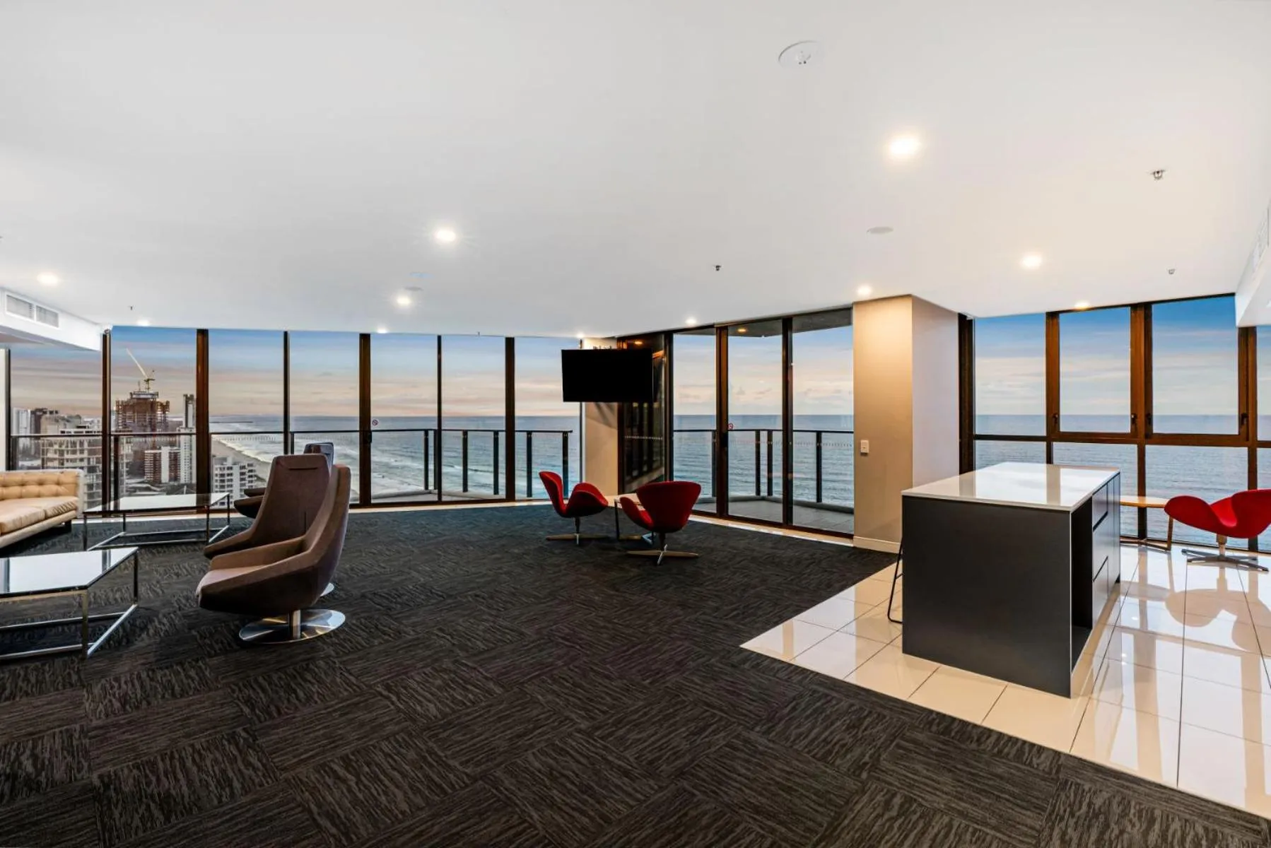 Communal lounge/ TV room in Rhapsody Resort - Official