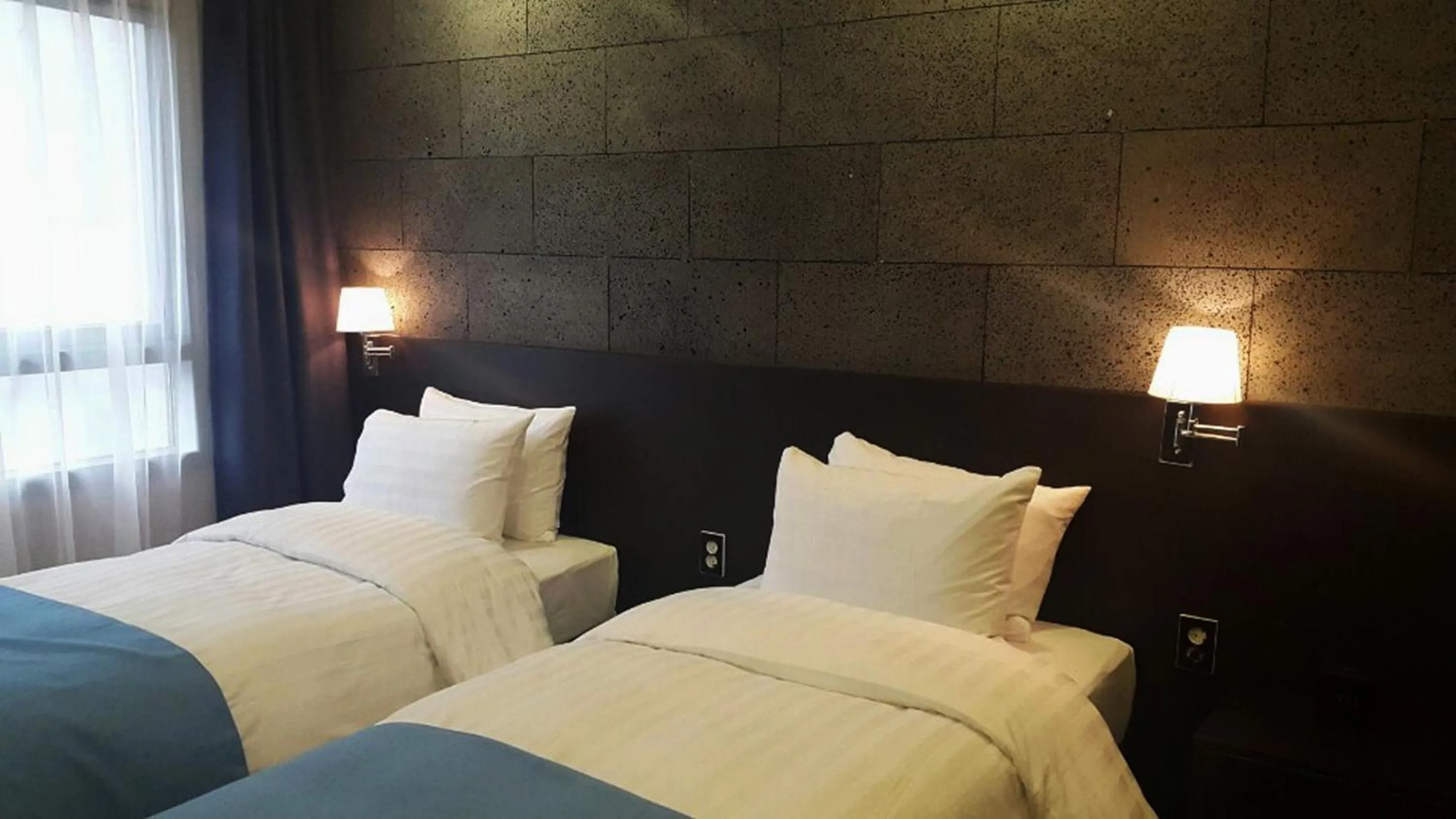 Bed in S Stay Dongtan Hotel