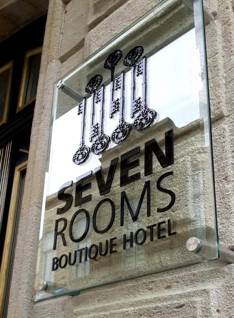 Property logo or sign in Seven Rooms Boutique Hotel