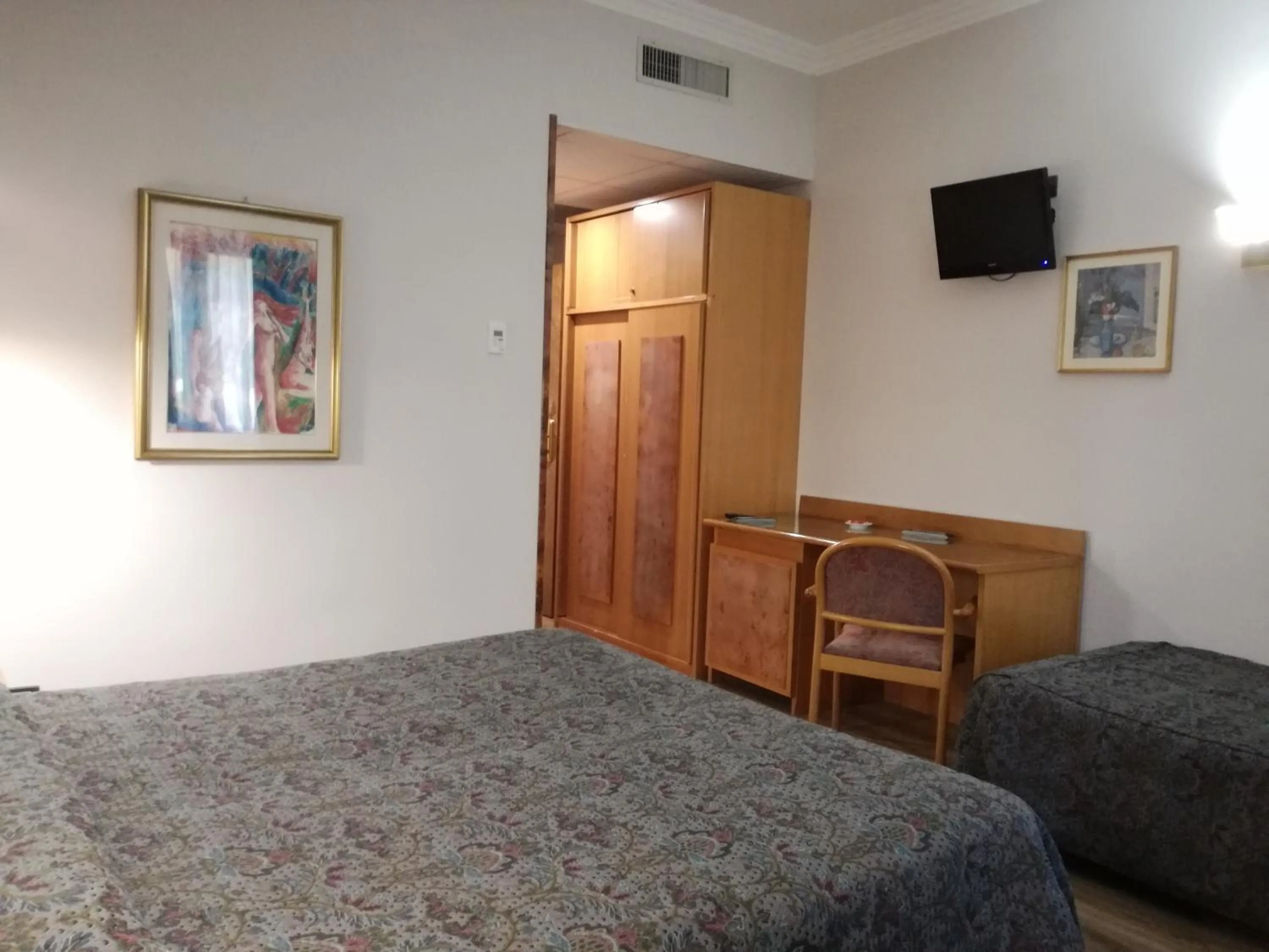 Bed in FILIPPONE HOTEL&RISTORANTE